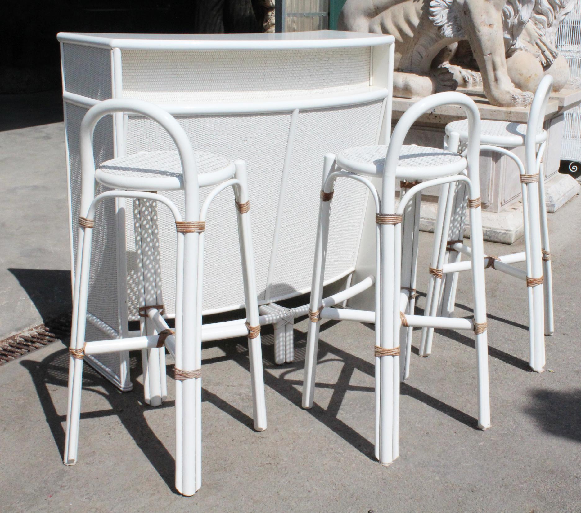 1980s Spanish bamboo, wood and rattan mini bar furniture with three stools.