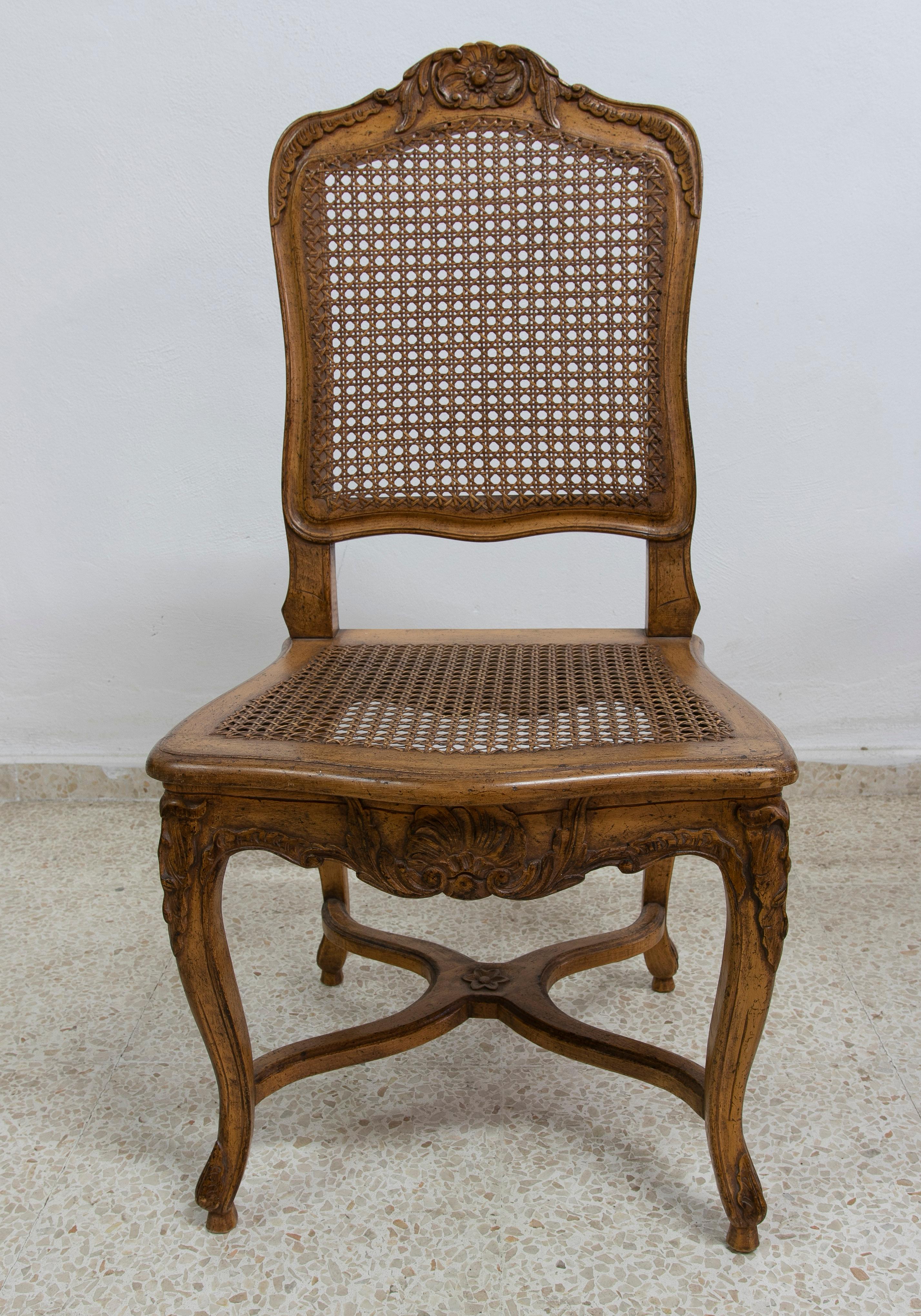Vintage 1980s Spanish handmade oak wood and woven cane set of French style 8-chairs and 2 armchairs.

Chairs measurements: 100 x 51 x 45cm
Armchairs measurements: 100 x 67 x 50cm.