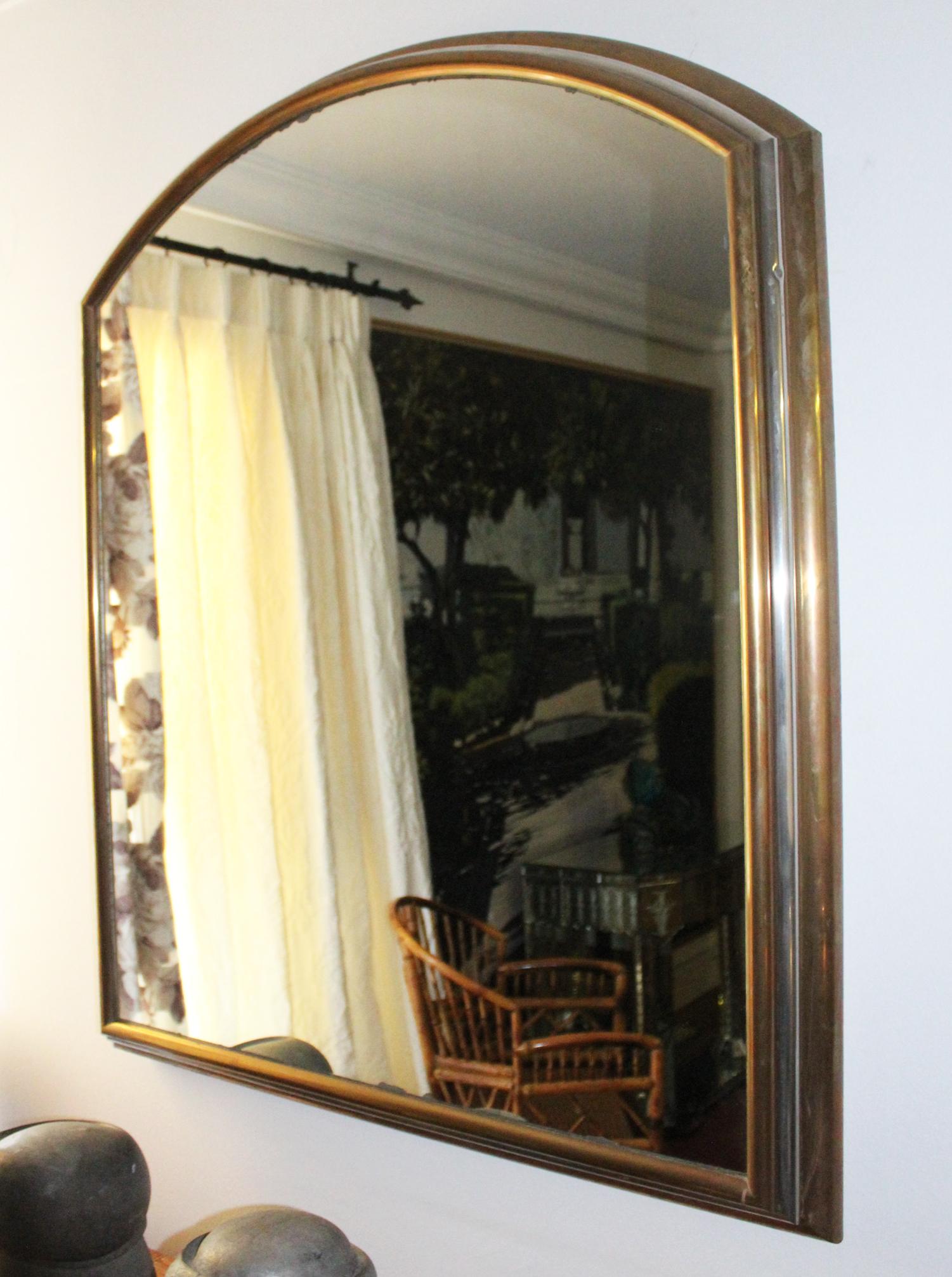 1980s Spanish metal mirror with two-tone brass frame.