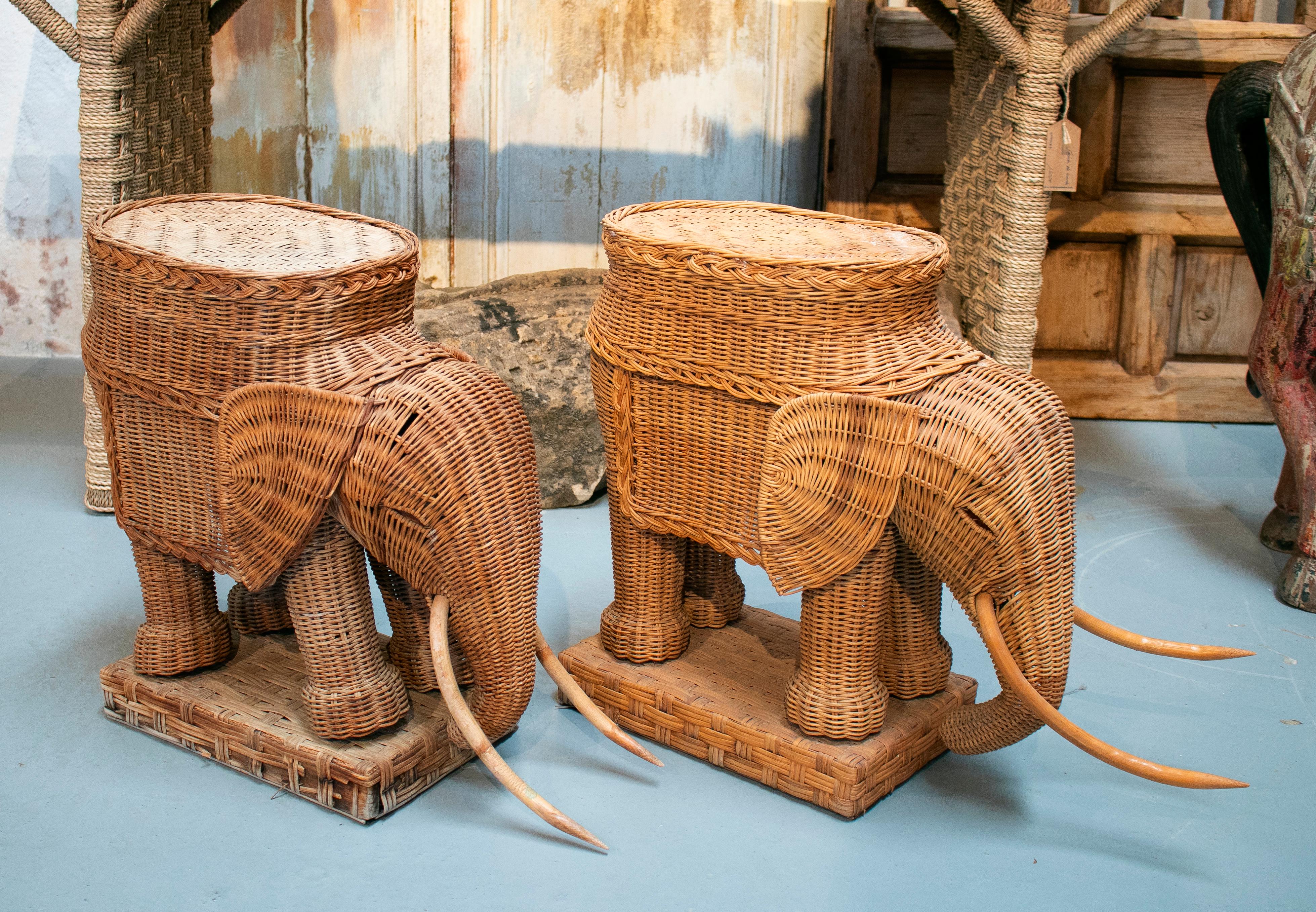 1980s Spanish pair of elephant weaved rattan side tables.