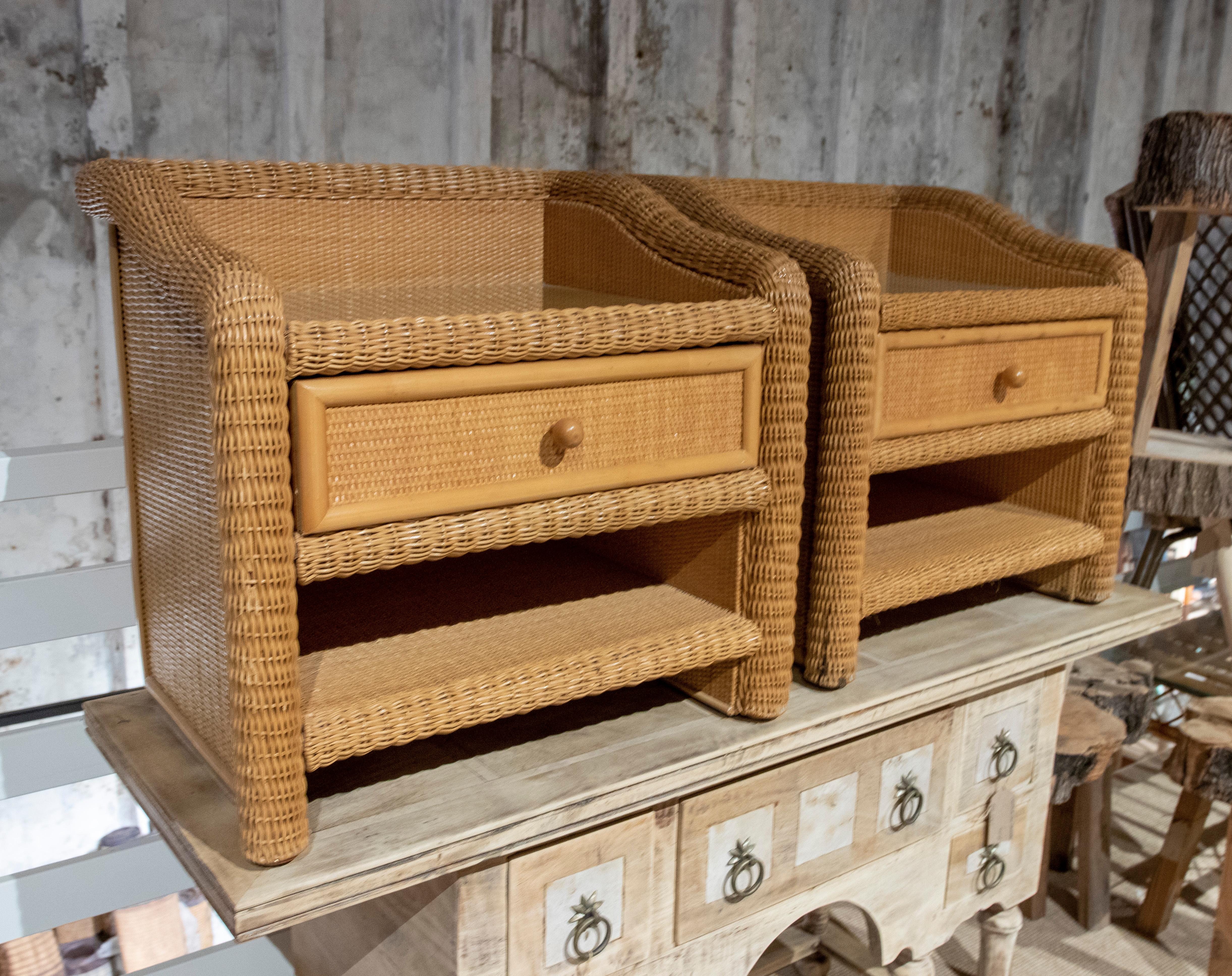 1980s Spanish pair of wicker bedside tables with drawer.
