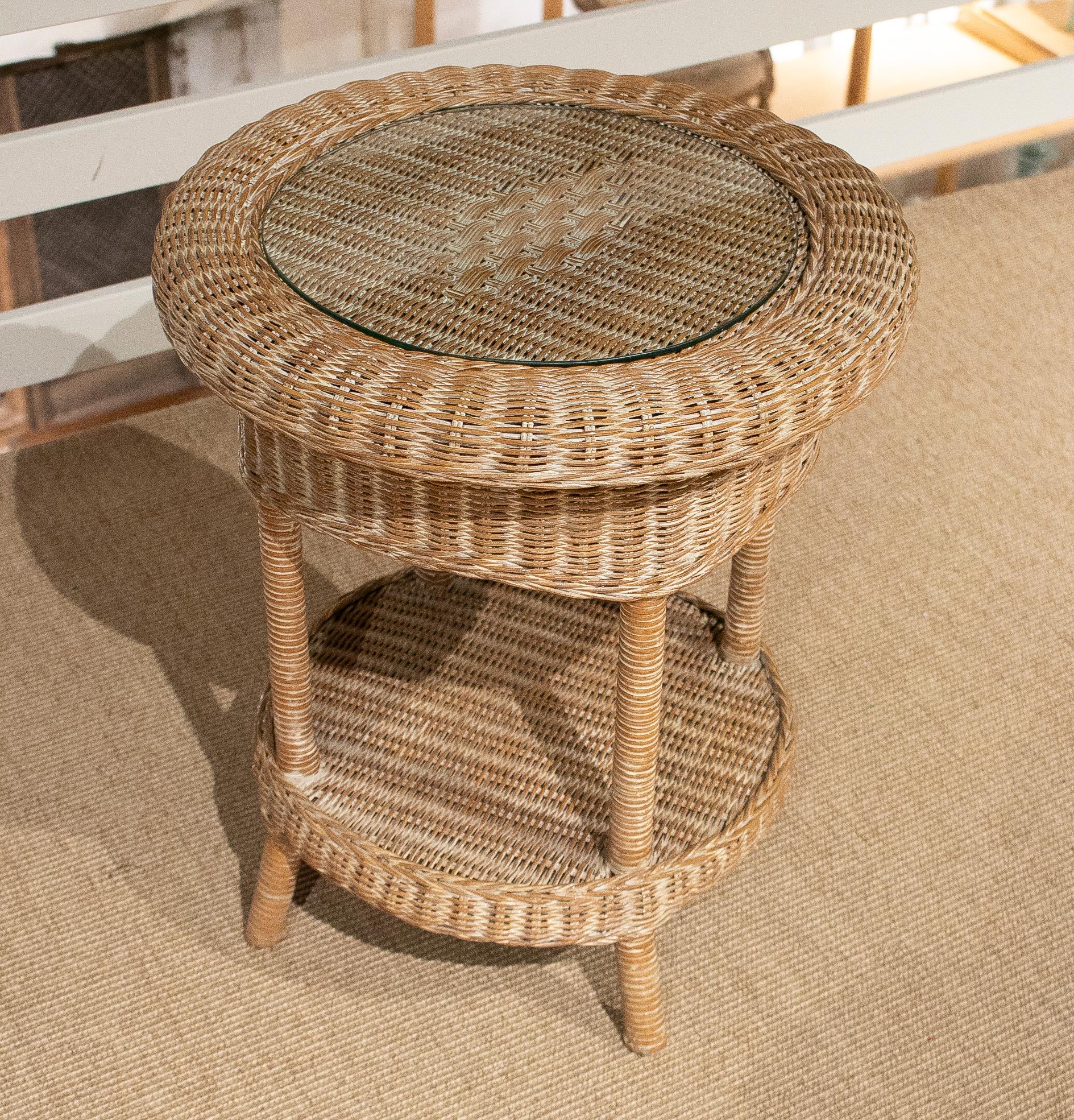 round wicker side table with glass top