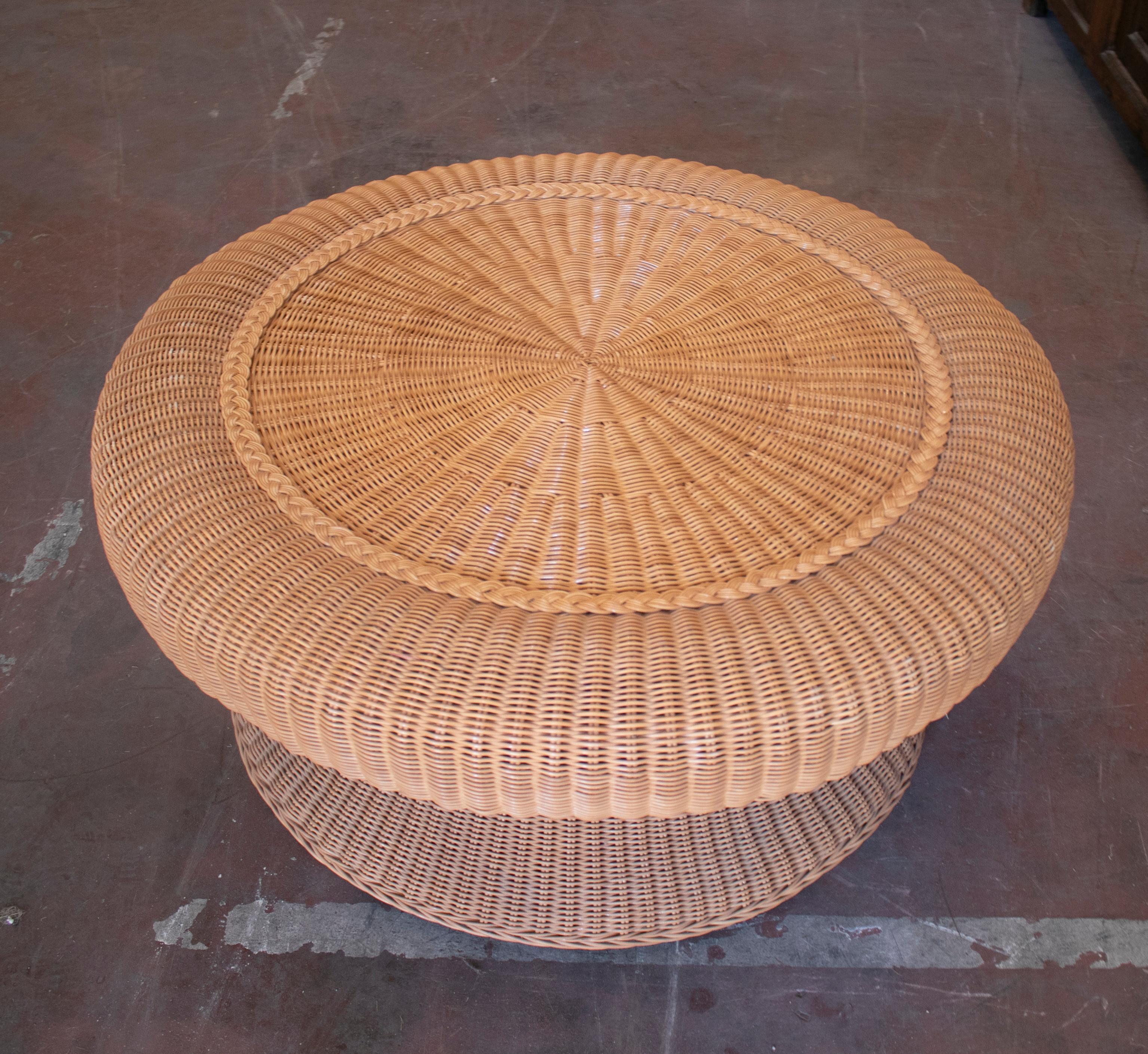 Vintage 1980s Spanish round woven wicker coffee table.