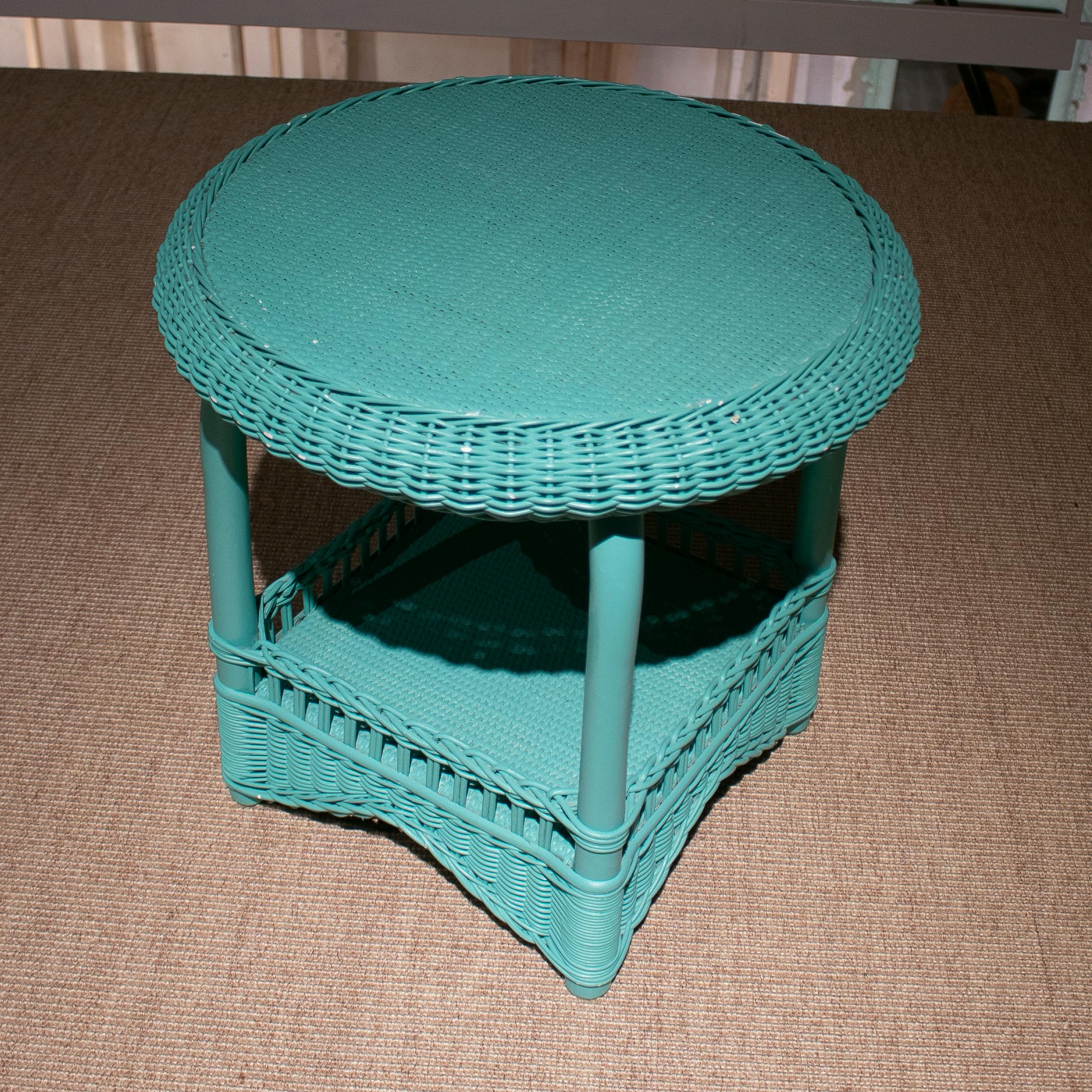Vintage 1980s Spanish turquoise lacquered hand woven wicker round side table.