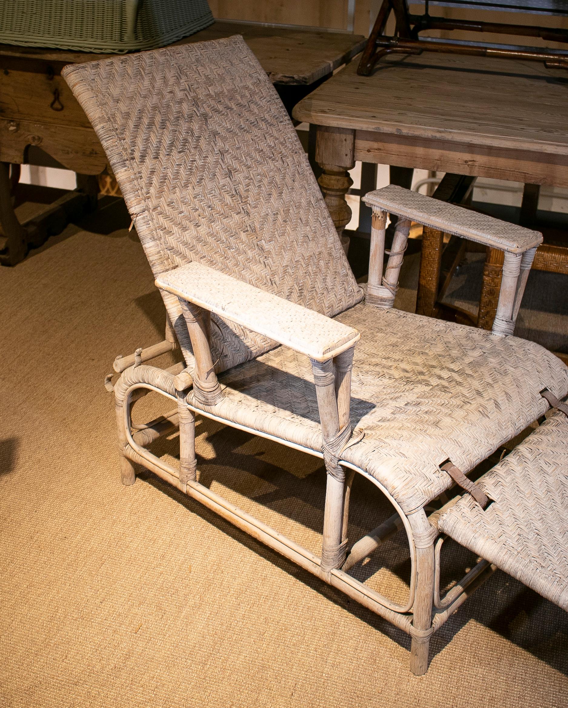 Vintage 1980s Spanish white bamboo and wicker folding sunbathing lounge chair.