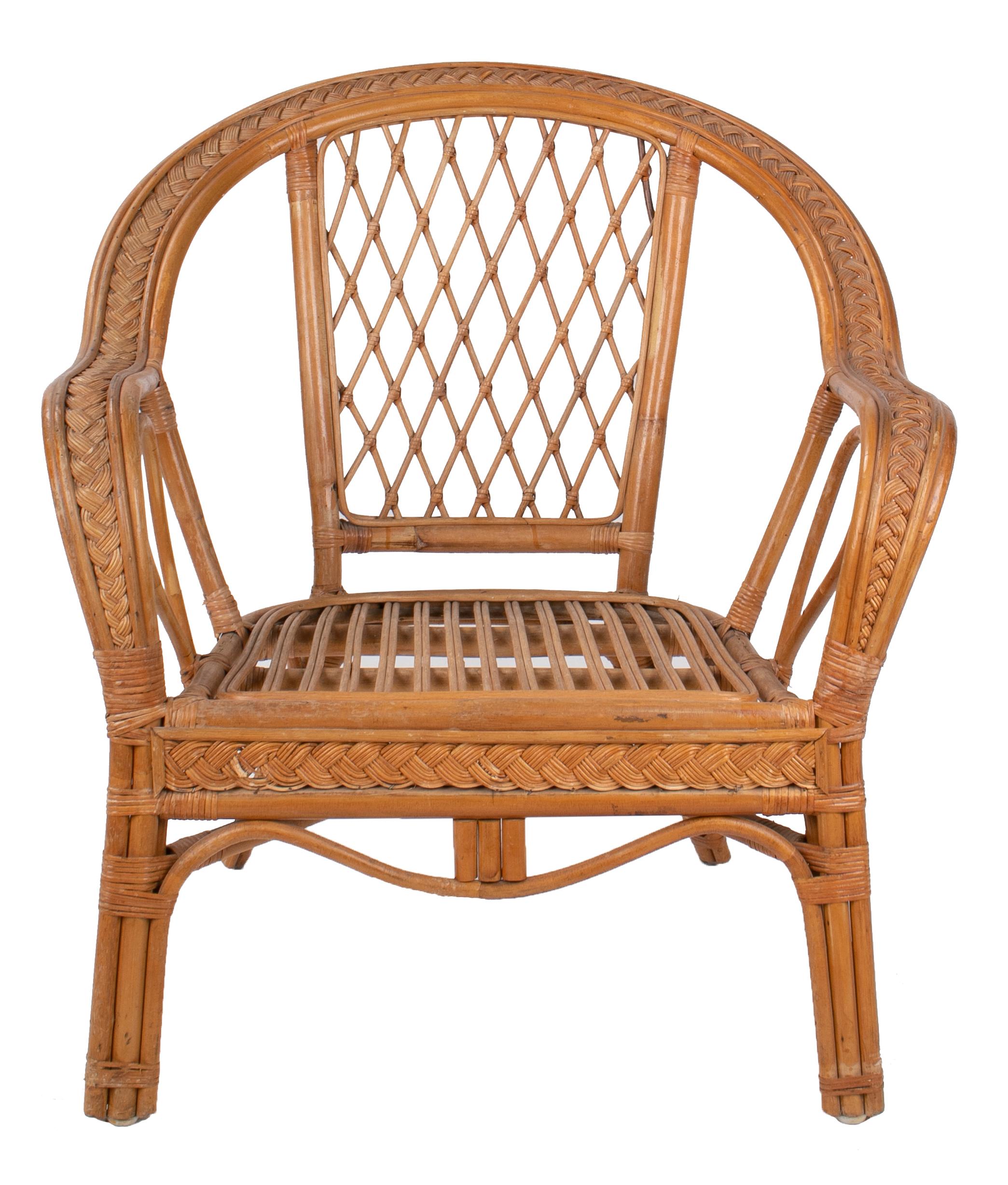 1980s Spanish wicker and bamboo decorated wooden armchair.