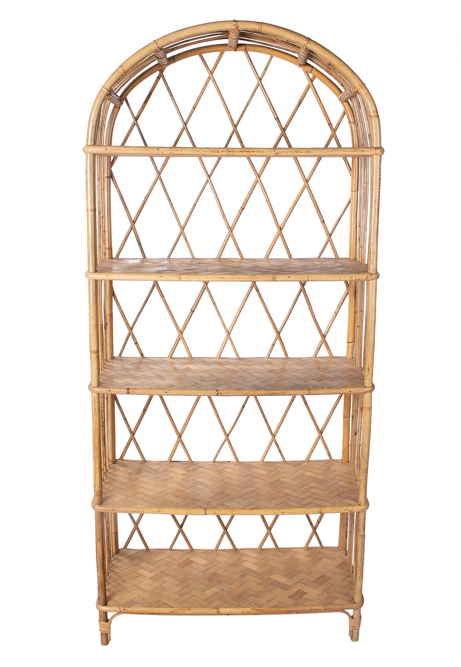 1980s Spanish woven wicker four rack shelf.