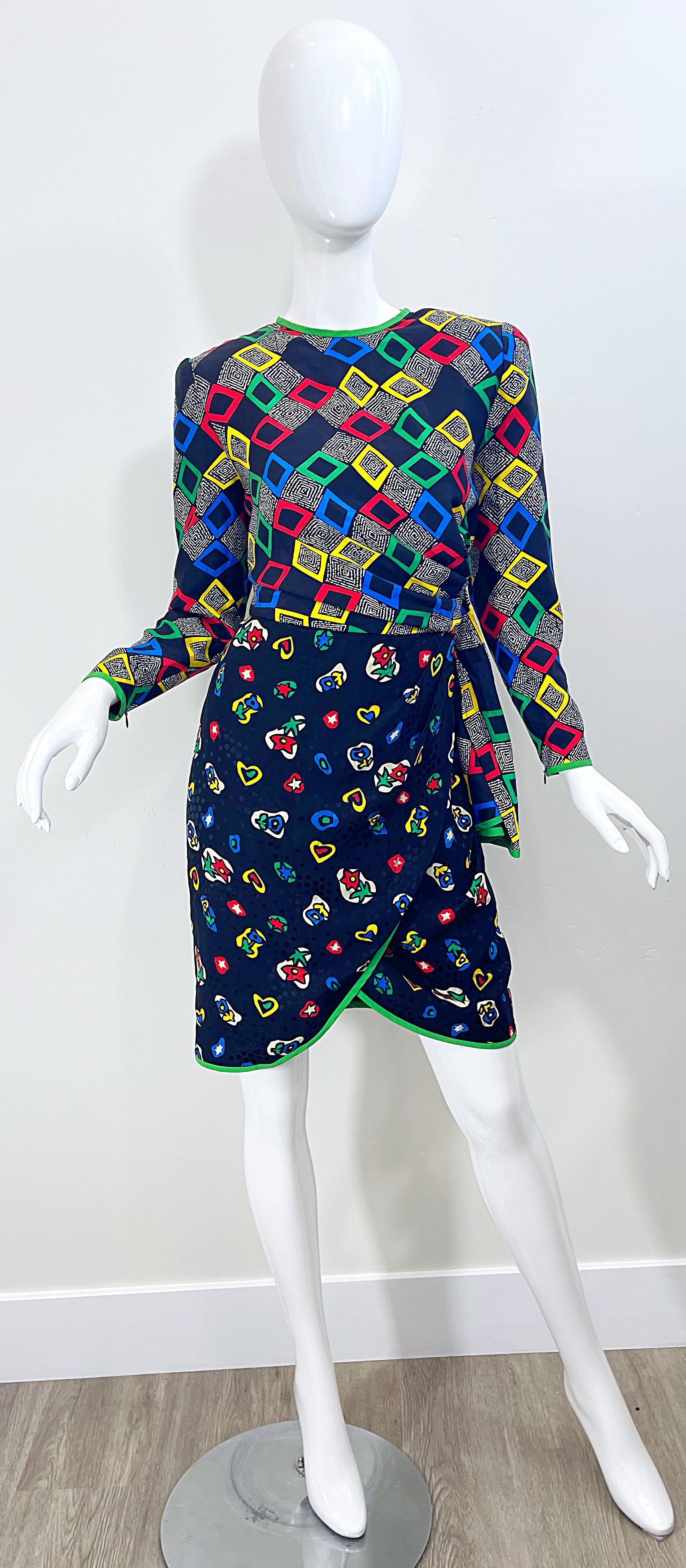 Chic 1980s STANLEY PLATOS / MARTIN ROSS abstract hearts and flower novelty print long sleeve silk dress ! Bodice features diamond square shapes in blue, red, green, yellow, black and white. Skirt has hearts and flowers scattered throughout. Hidden