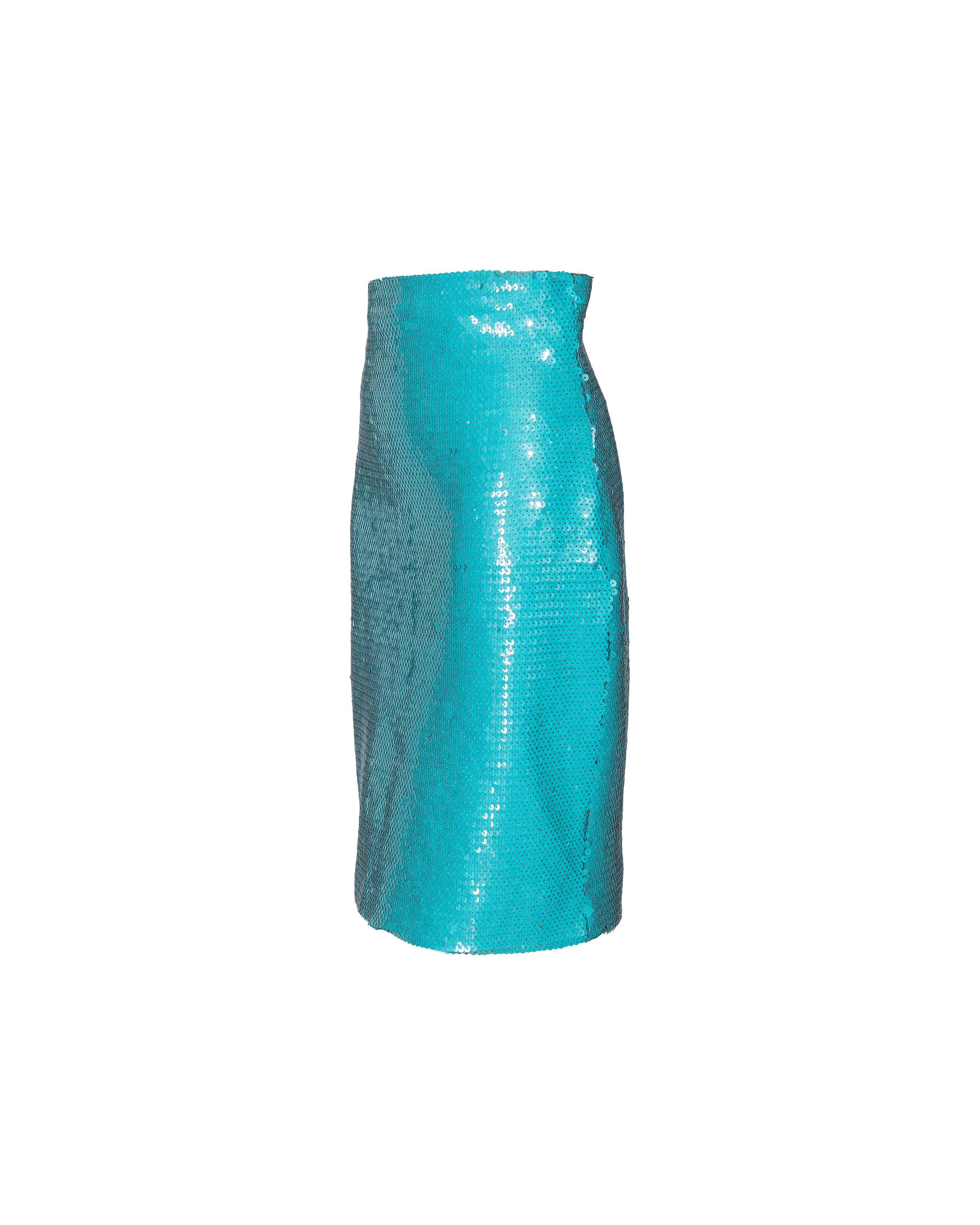 1980's Stephen Sprouse turquoise fully sequined skirt. Concealed back zip closure and small center back slit. Boning at sides and wide hip creates subtle 'mod' silhouette. Fabric Contents: 84% Polyester, 16% Lycra. Fully lined with black lining.