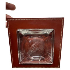 1980's Stitched leather and glass ashtray by Maison Hermès