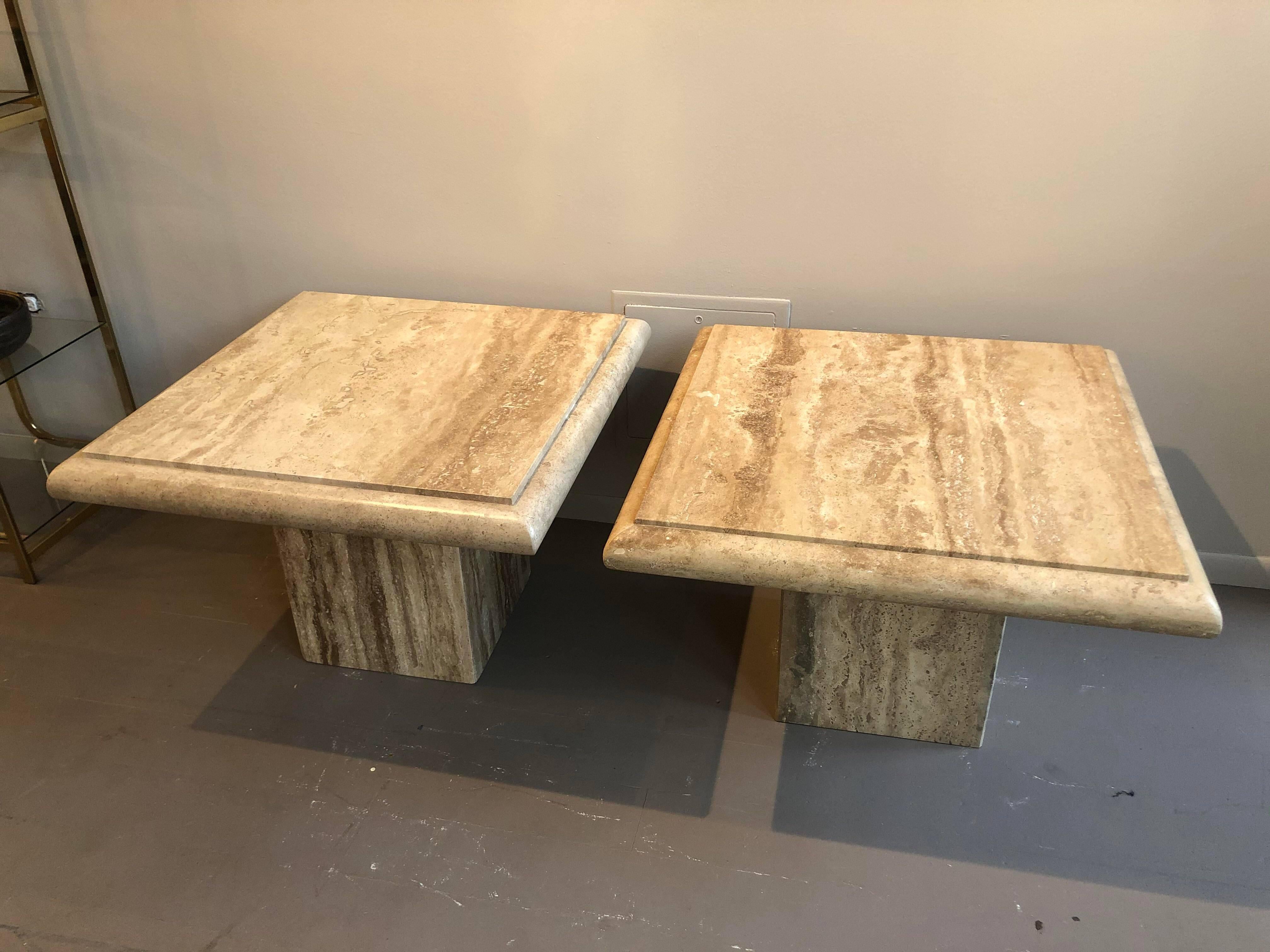 Gorgeous pair of creamy taupe brown travertine. Very solid, no chips or cracks anywhere. Darker than most travertine, these tables are beautiful.

Dimensions: 30