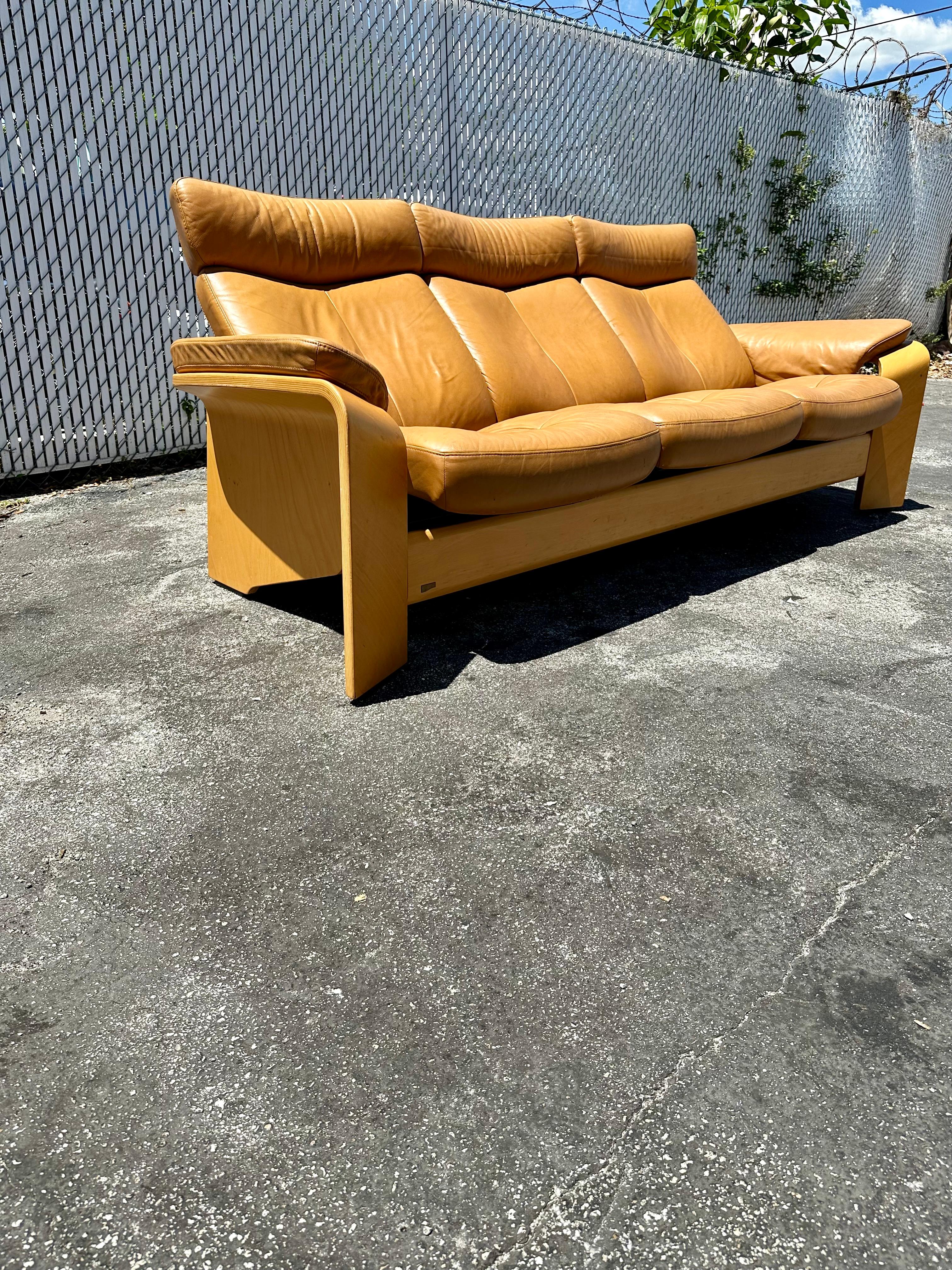 1980s Stressless Tan Leather Teak Wood Reclining Sofa For Sale 1