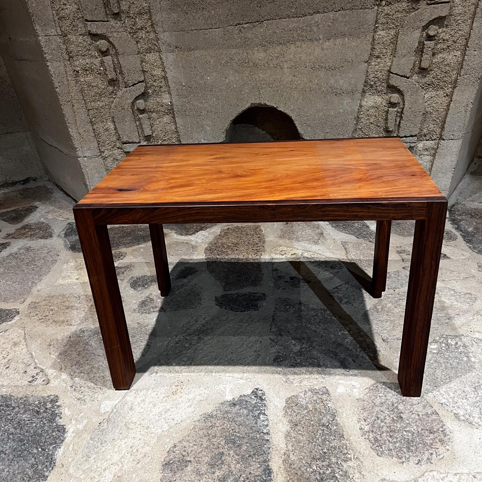 Studio Piece Clean Organic Modern Solid Wood Side Table.
Beautiful grain. 
George Nakashima style.
Side and legs solid rosewood. The top appears as mahogany.
No markings.
Great quality.
Firm and sturdy. Original preowned vintage condition.
16 in. H