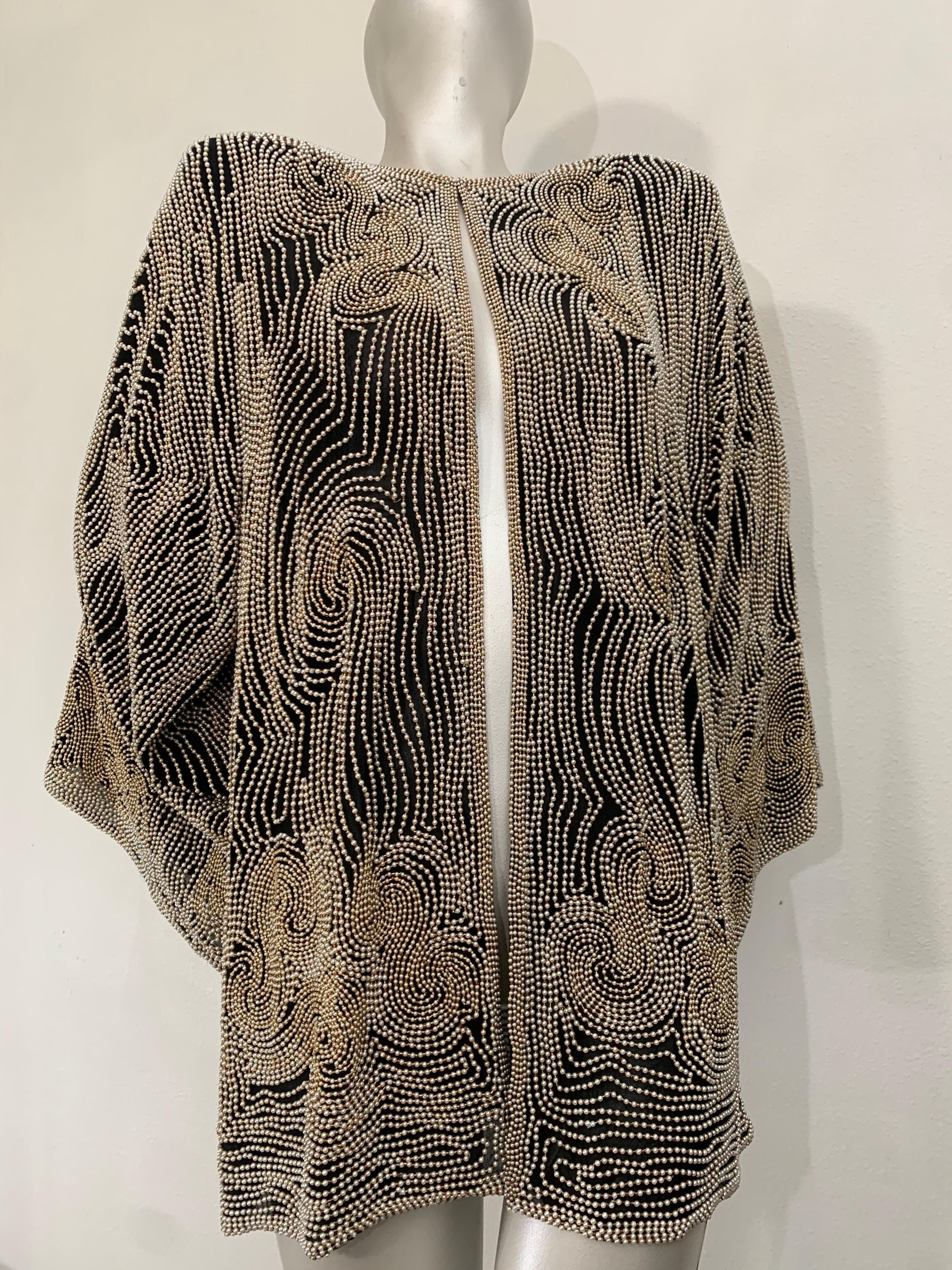 1980s SUZ Black Silk Chiffon Jacket Heavily Encrusted w Faux Pearls in a Cloud Motif:  Stunning Art Nouveau-inspired beadwork! Thousands of faux pearls in a beautiful swirling cloud pattern. Padded shoulders and wide kimono sleeve shape for a
