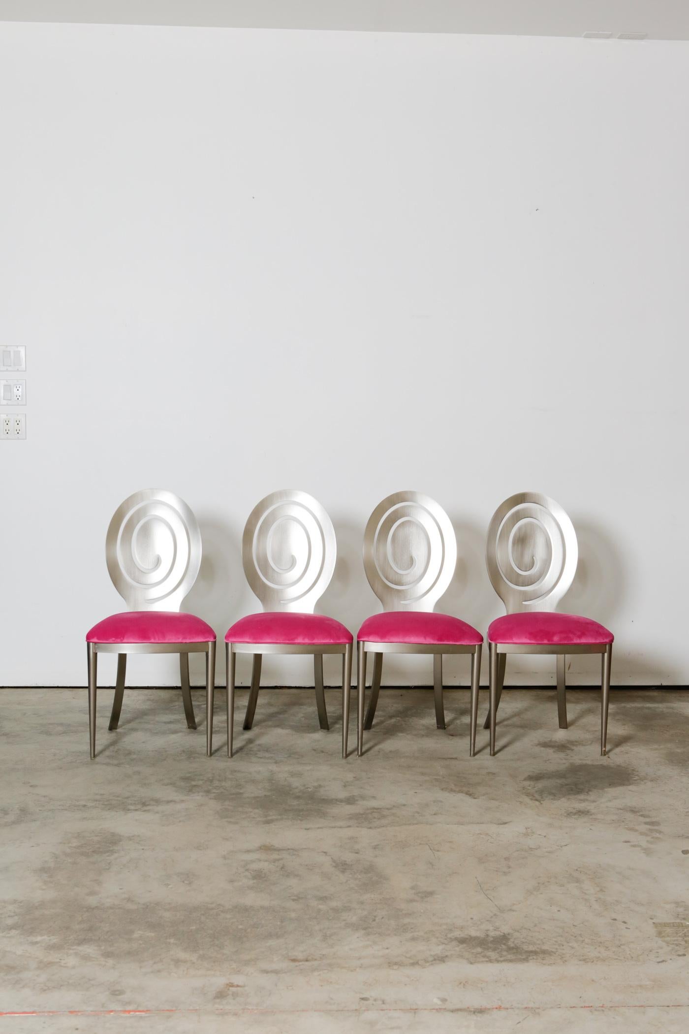 1980s swirling dining chairs in pink velvet new upholstery

These stainless steel chairs are the perfect balance of class and durability. With a new upholstery, the lush pink velvet fabric adds a unique addition that creates a pop of color. These