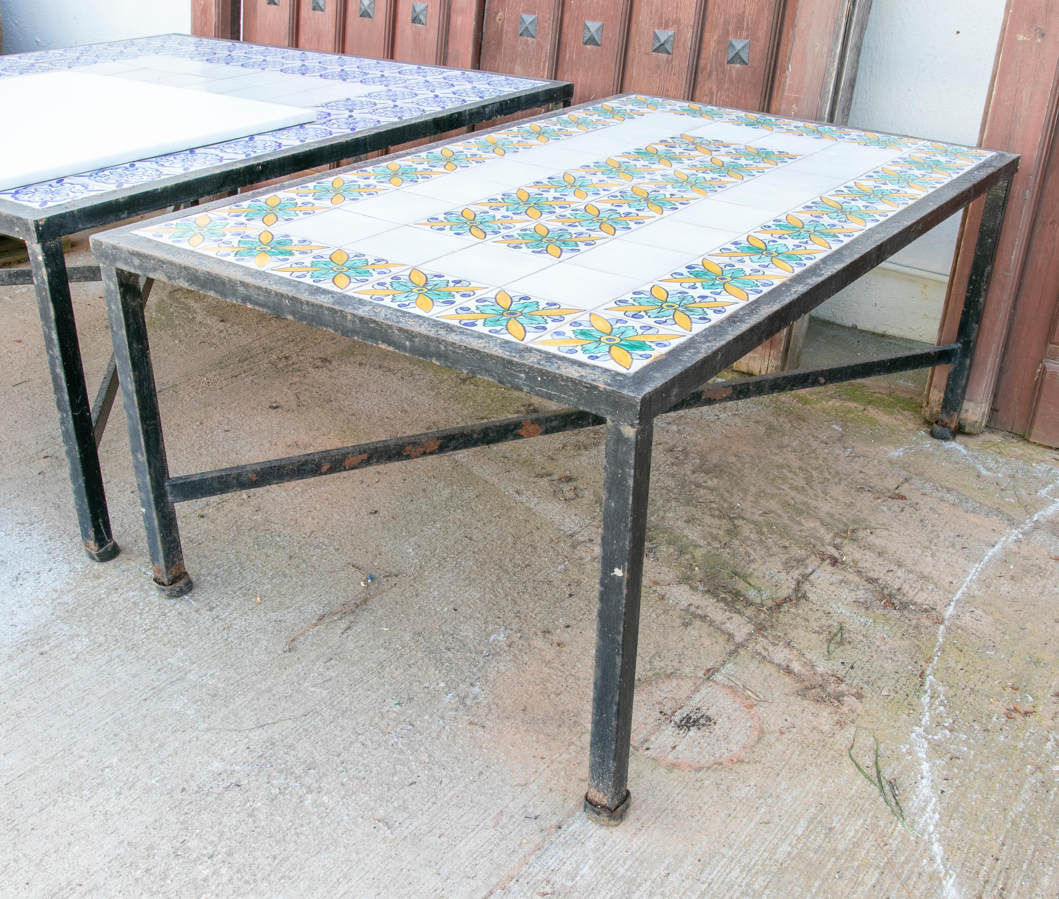 1980s Table with Iron Base and Geometrical Tiles on top.