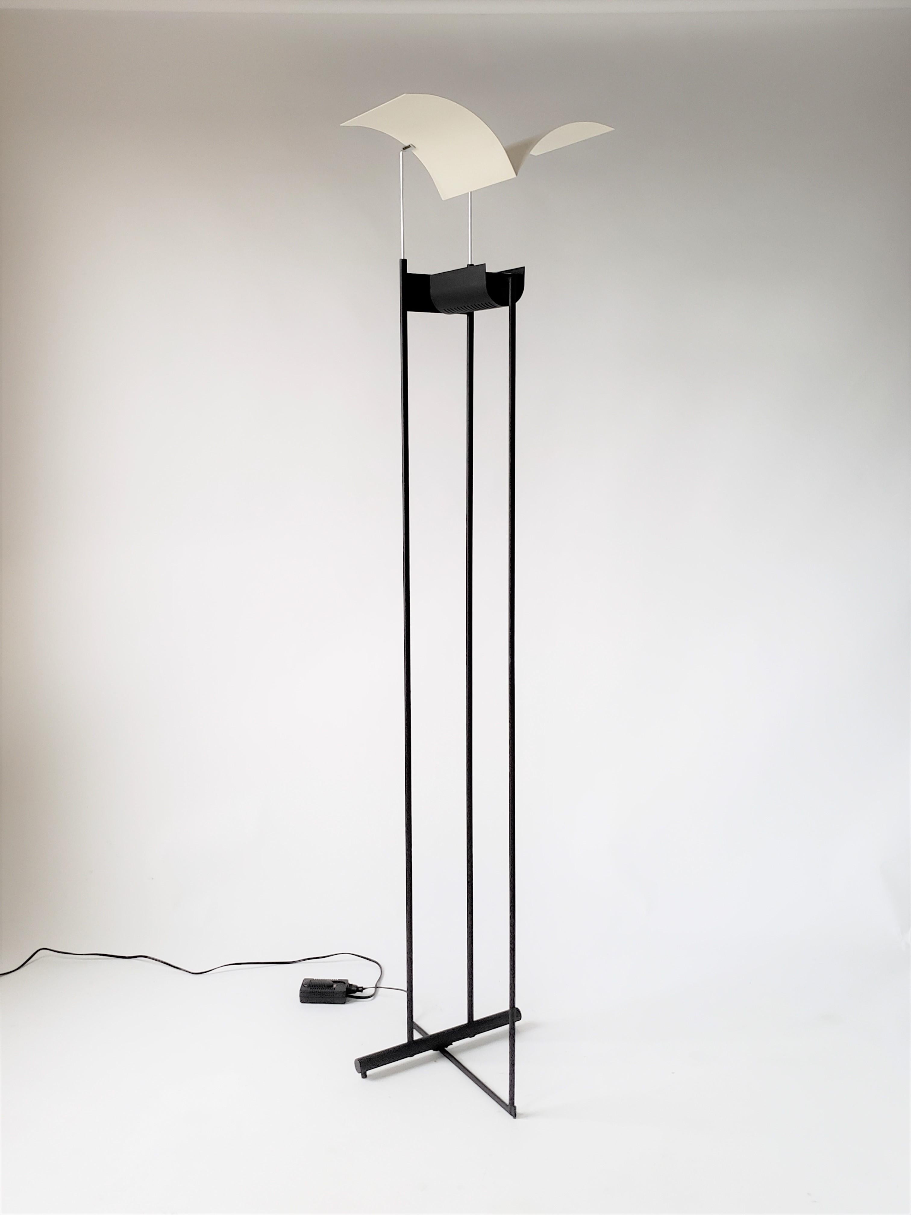 Gracious halogen floor lamp with sculptural enameled matte white aluminium shade.

Rugged finish semi gloss black frame.

Measure 73 inches tall. 

Rated at 300 watt 

After market foot dimmer supplied with order.