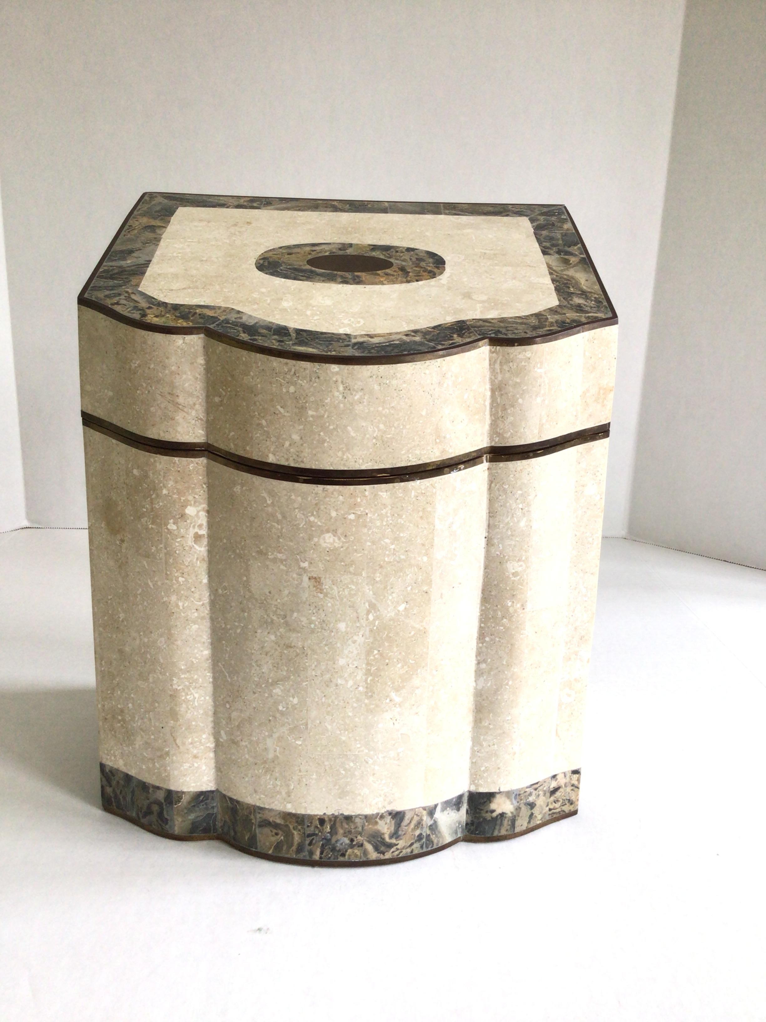 1980s Tesellated Stone and Brass Inlayed Tall Box is covered in contrasting marble
Brass trim lines the lid's rim
This hinged lid opens to a beautifully finished wood interior
Curvilinear front and sloped design make this storage box unique and