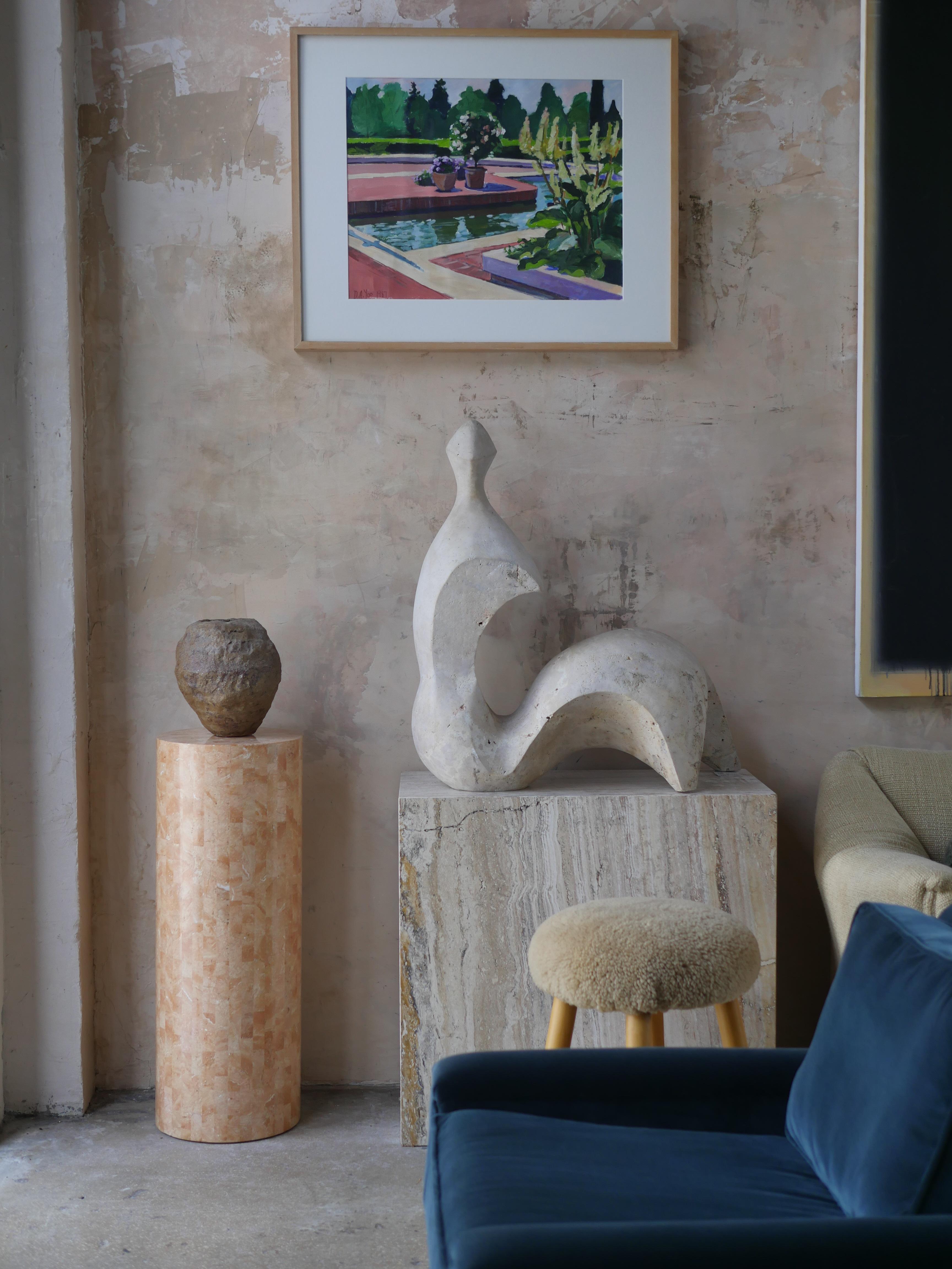 Stylish 1980s tessellated stone pedestal by Casa Bique. Crafted from tessellated stone in variants of coral hues, this cylindrical pedestal makes for a nice accent piece to display your sculptures or plants on.
