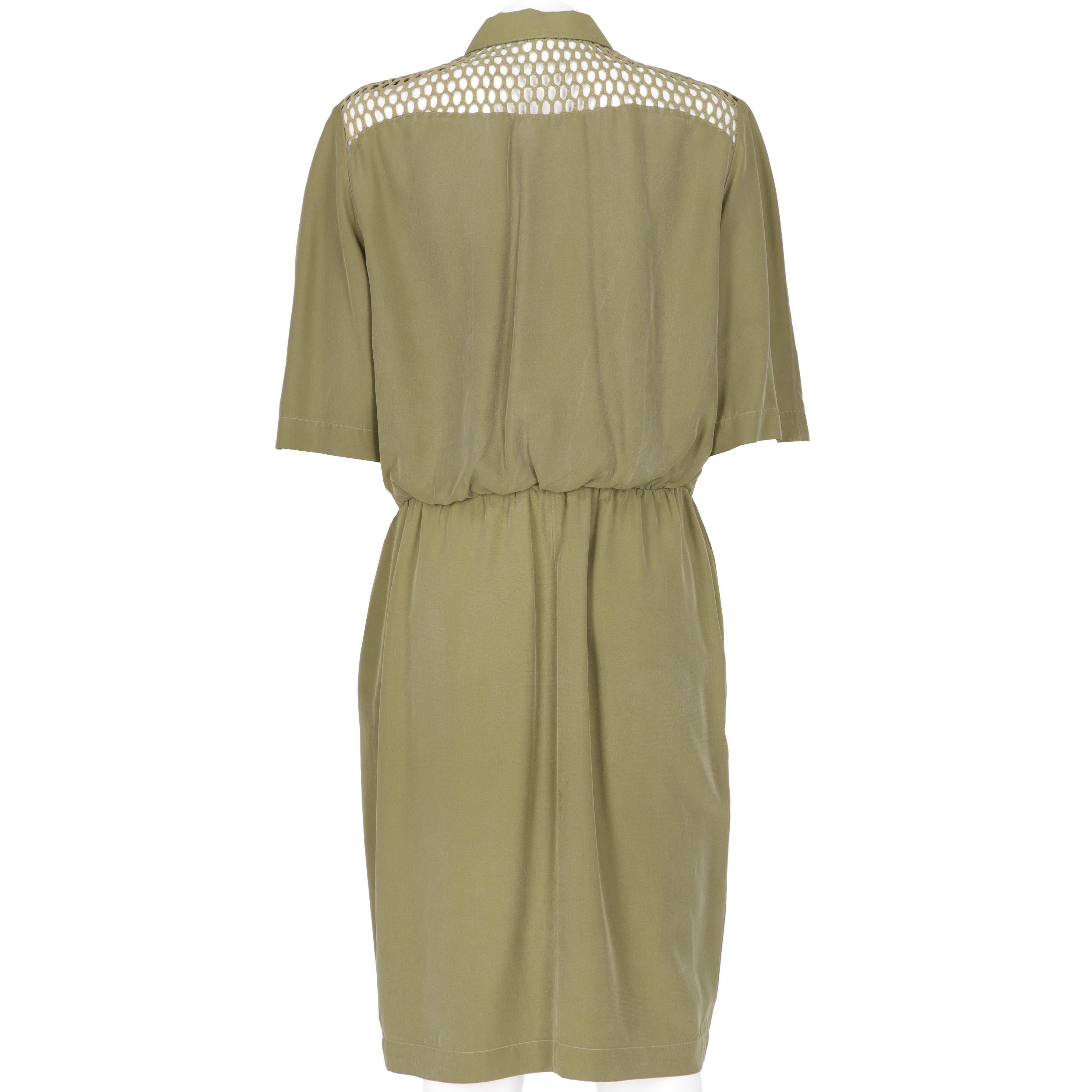 Thierry Mugler military green silk long chemiser dress, shaped collar with round tips and metal press studs full-length fastening, decorated with tone on tone green plastic small cone. The soft bodice features a refined knitted cotton net upper part