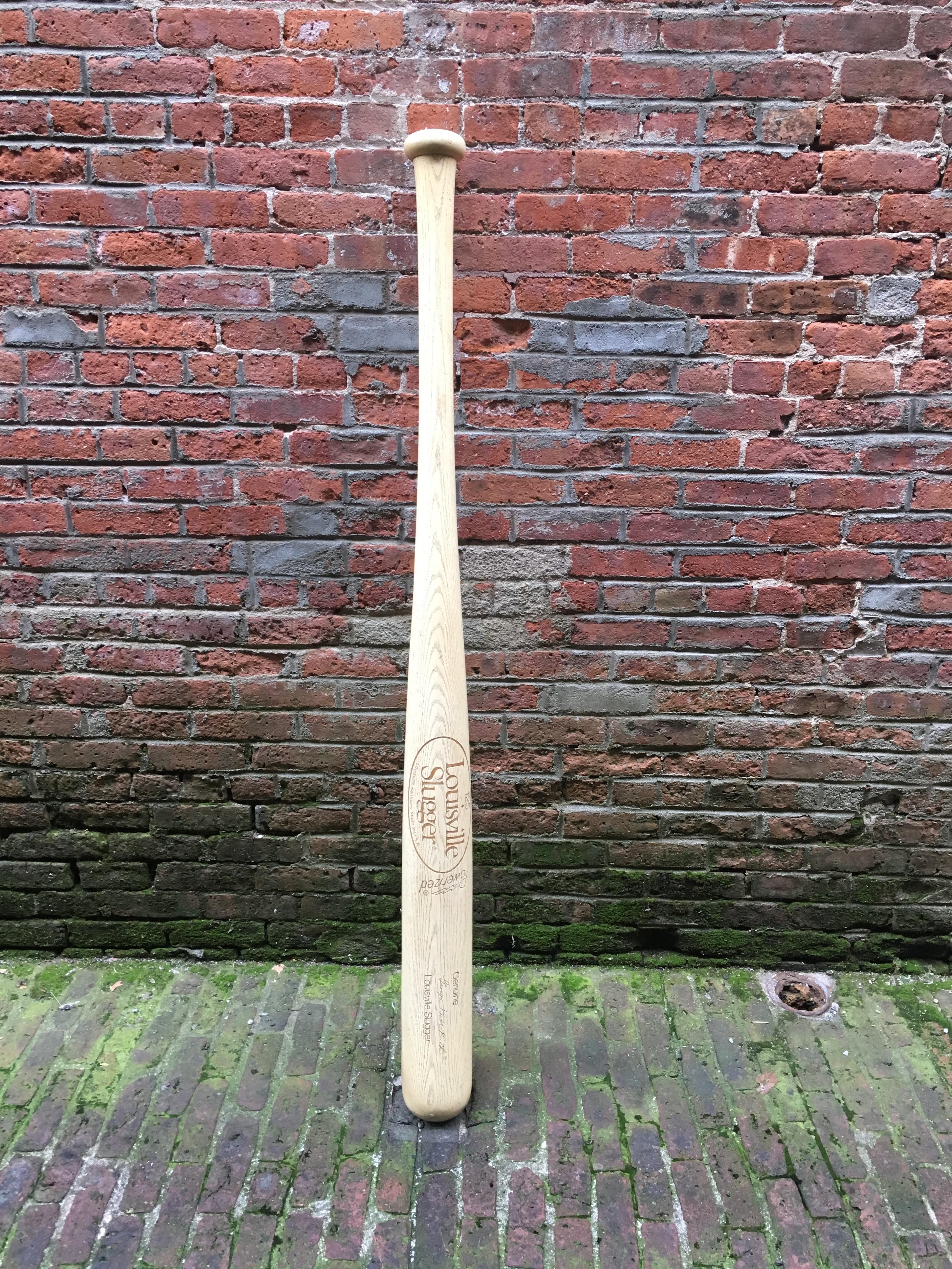 Tremendous think big baseball bat. Replica of the famous Louisville Slugger baseball bat. Signed with George Herman Ruth's (Babe Ruth) burn in signature, circa 1980. Very good original condition.

Measures: 99