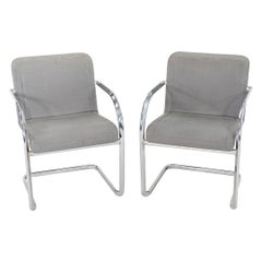 Poltroncine da pranzo a slitta Thonet cromate degli anni '80 in tessuto grigio