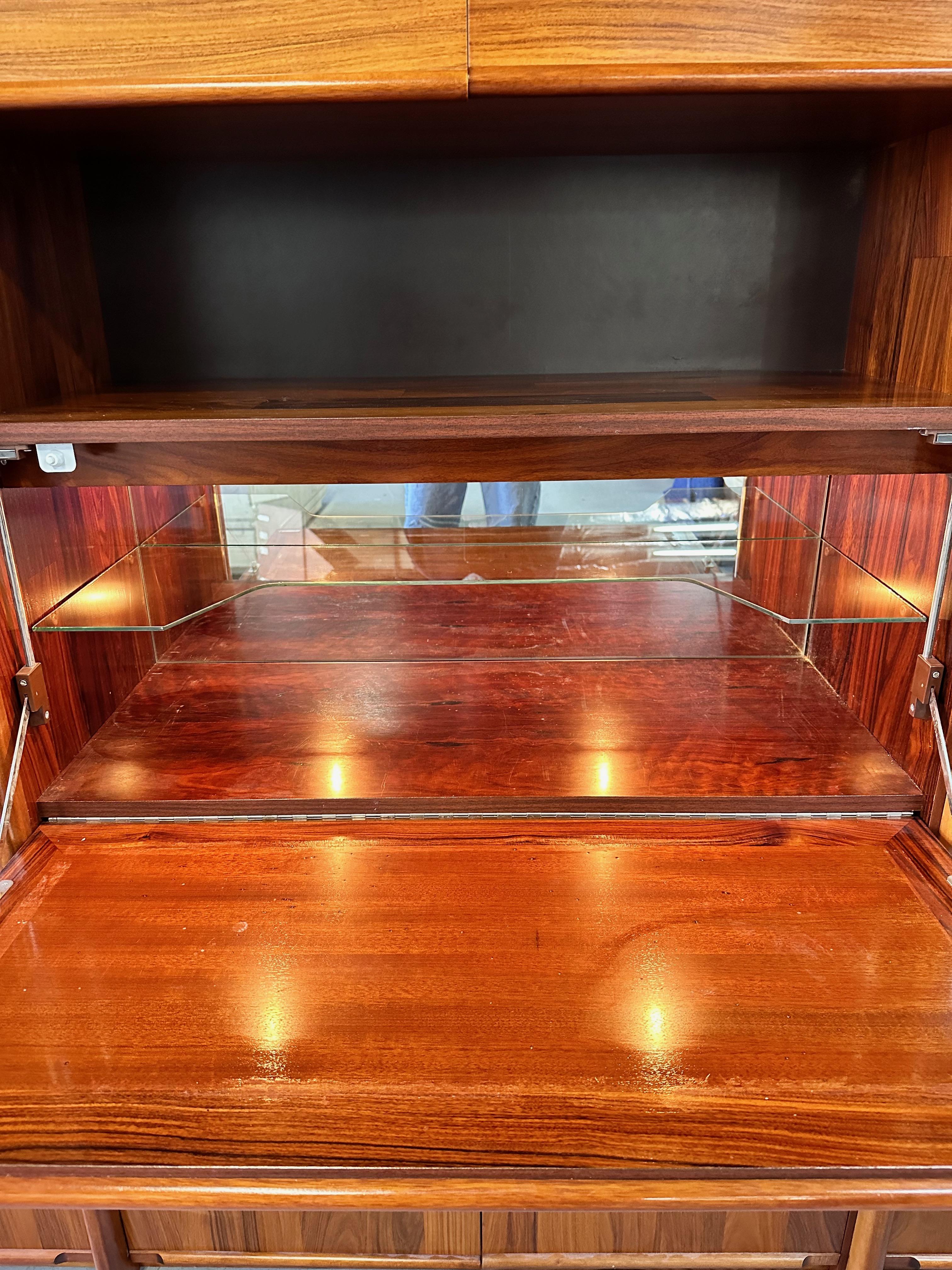 1980s Three Piece Lighted Rosewood Veneer Wall Unit the Style of Jorge Zalszupin In Good Condition For Sale In Philadelphia, PA