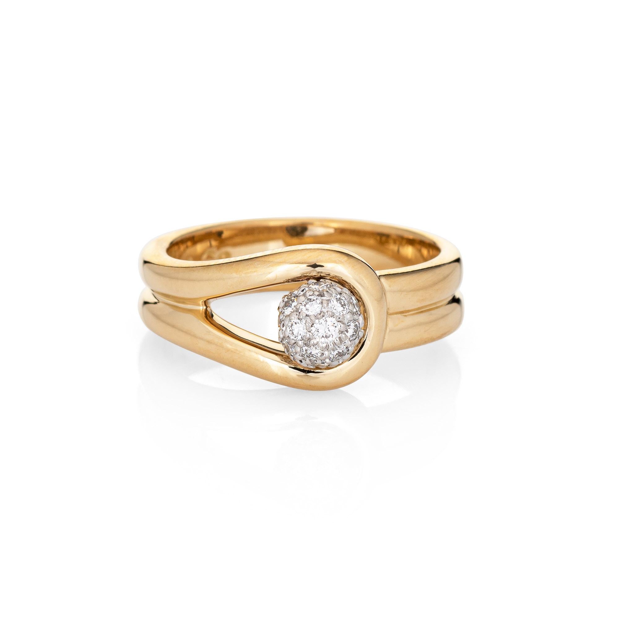 Vintage Tiffany & Co diamond orb ring (attributed to Paloma Picasso), crafted in 18 karat yellow gold & platinum (circa 1980s).  

Round brilliant cut diamonds total an estimated 0.25 carats (estimated at G-H color and VS1-2 clarity).

Dating to the