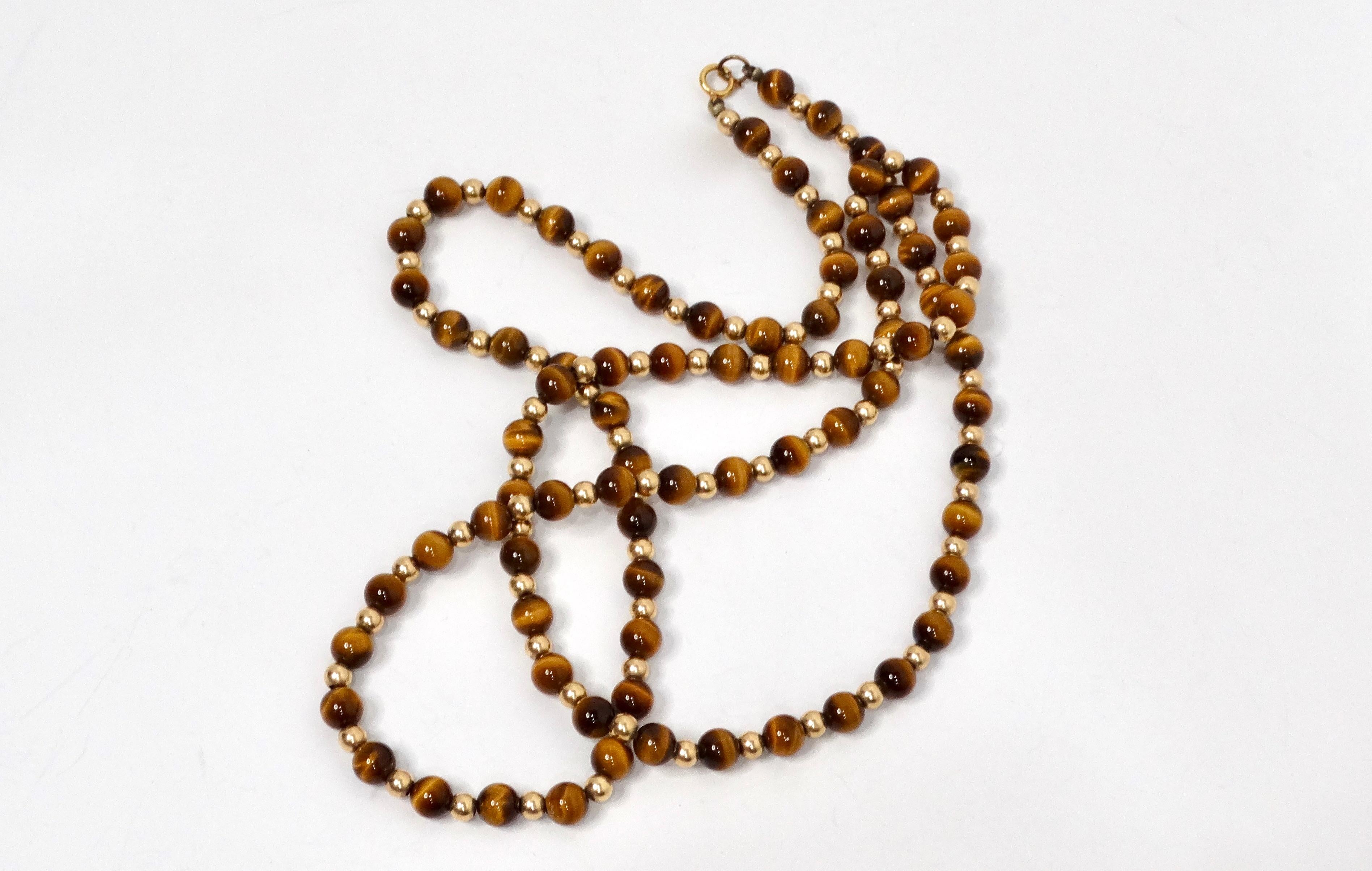 Collier long perlé en or jaune 14 carats et œil de tigre des années 1980 Bon état - En vente à Scottsdale, AZ