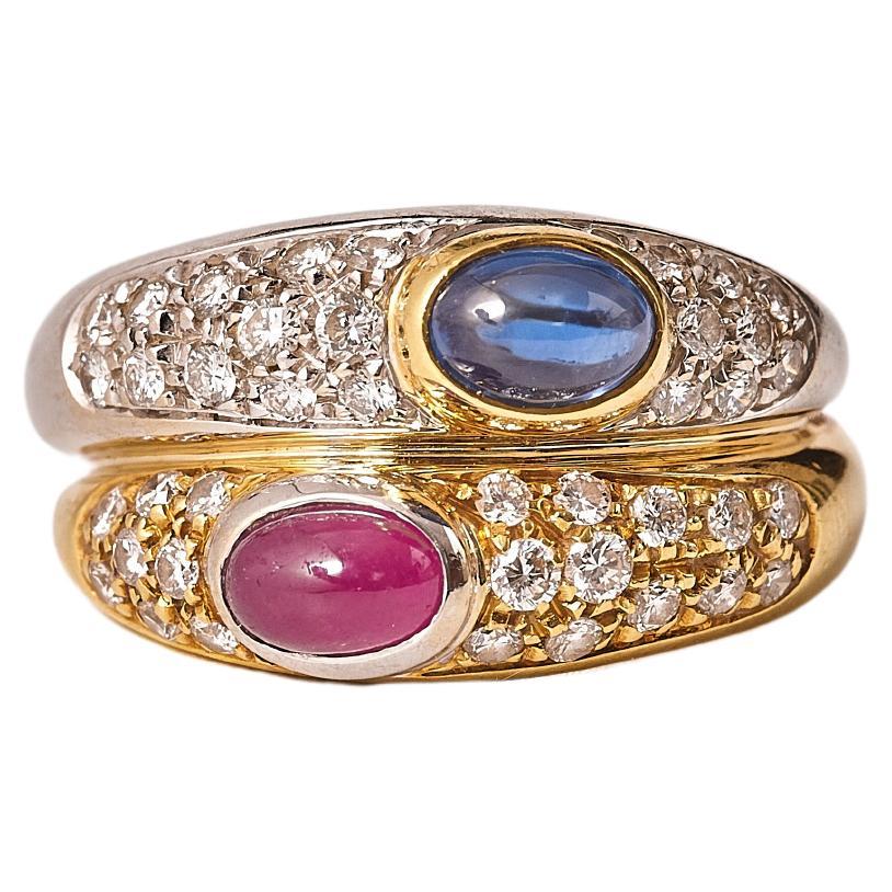 Anello anni 
80 "Toi et Moi" in rubino, zaffiro e diamanti in oro 18kt. in vendita