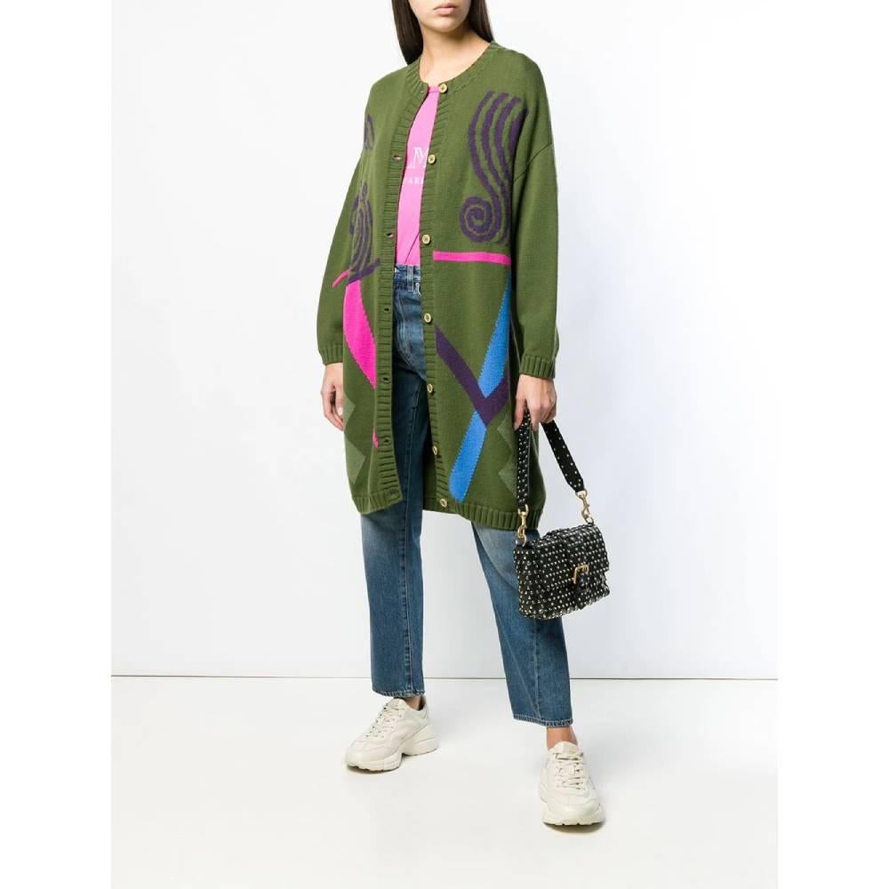Touche long cardigan in olive green wool with multicolored abstract pattern. Model with round neckline, front fastening with buttons. Drop shoulders and long sleeves. Oversize fit.
Years: 80s

Made in Italy

Size: 44 IT

Flat measurements

Height:
