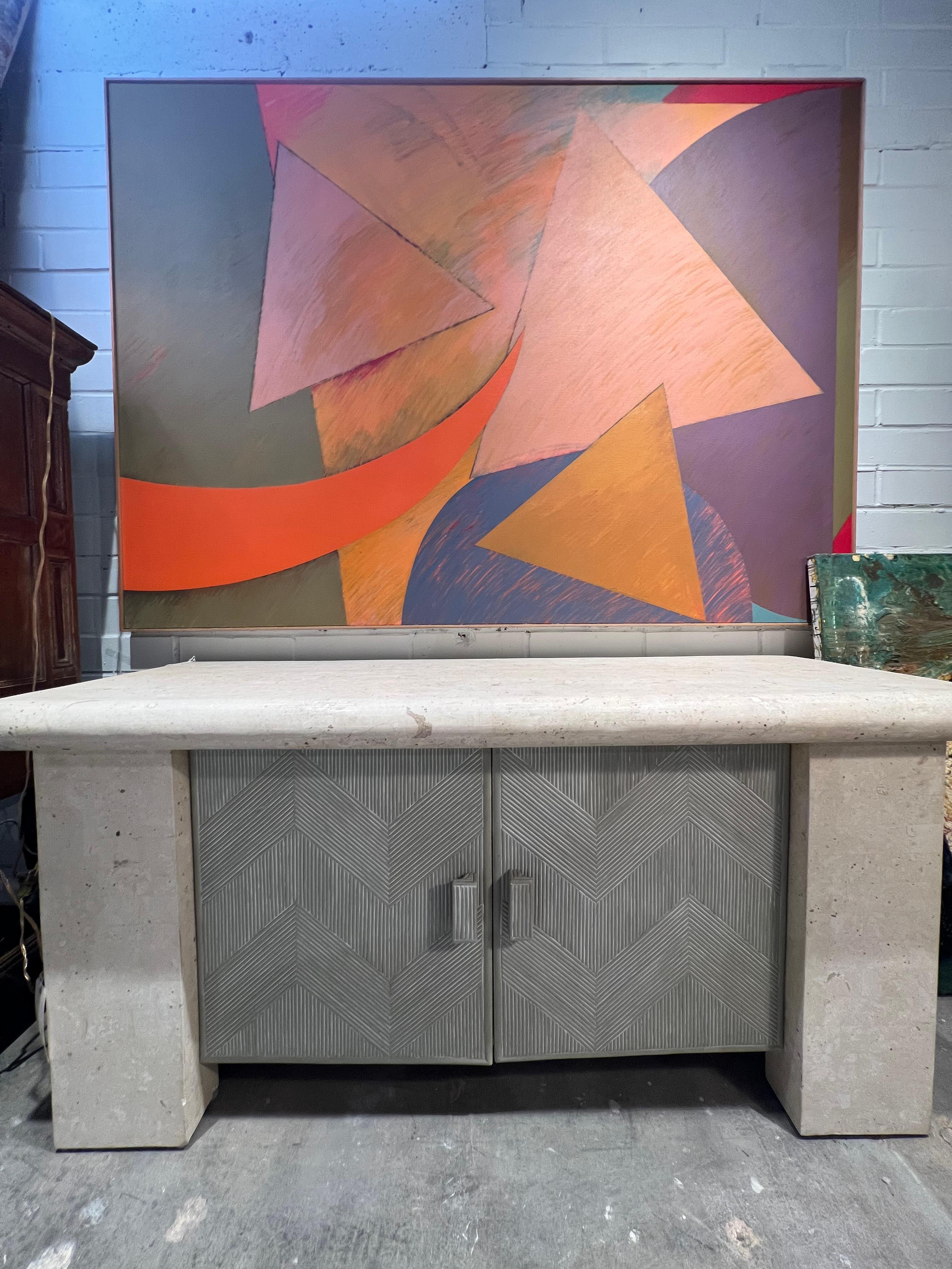 Credenza a due ante del 1980 in travertino e canna da zucchero. 