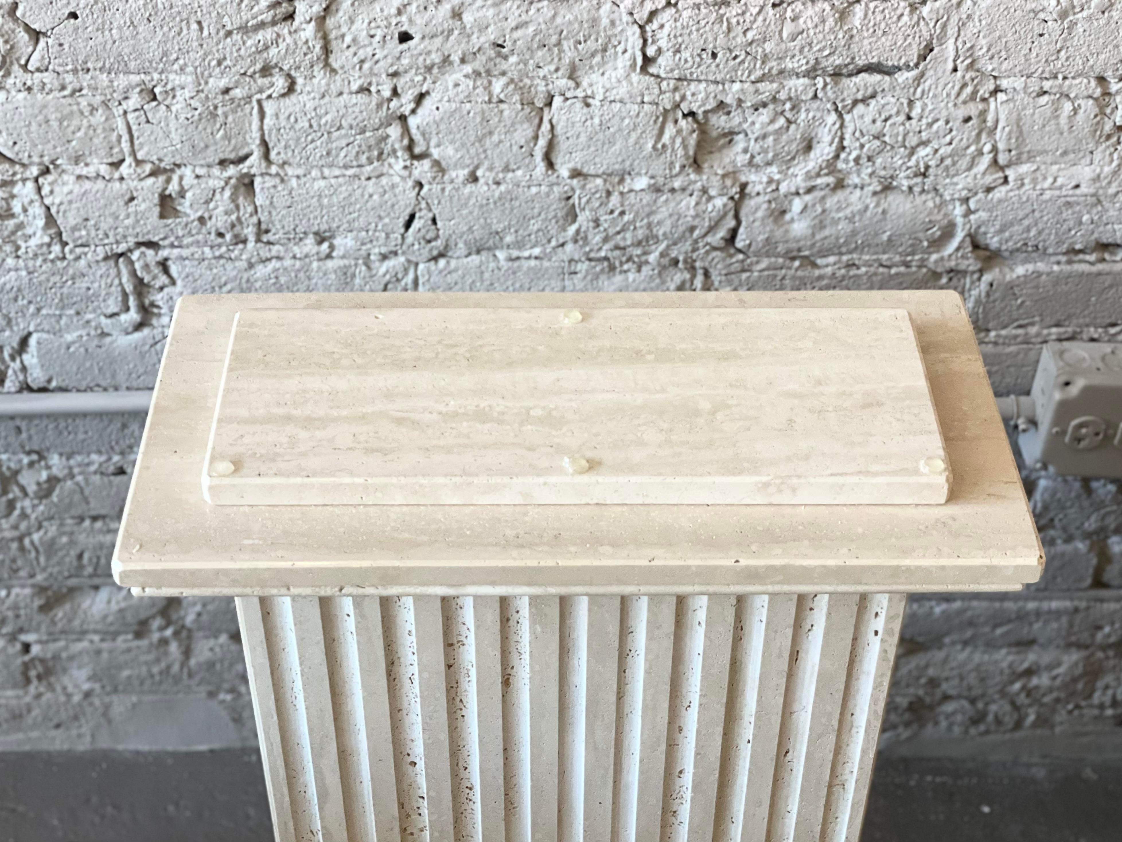 Beautiful, elegant, simple pair of travertine postmodern pedestals. These are so heavy! I think they are absolutely solid stone. Use as pedestals with decor on top or as bases for a dining table.