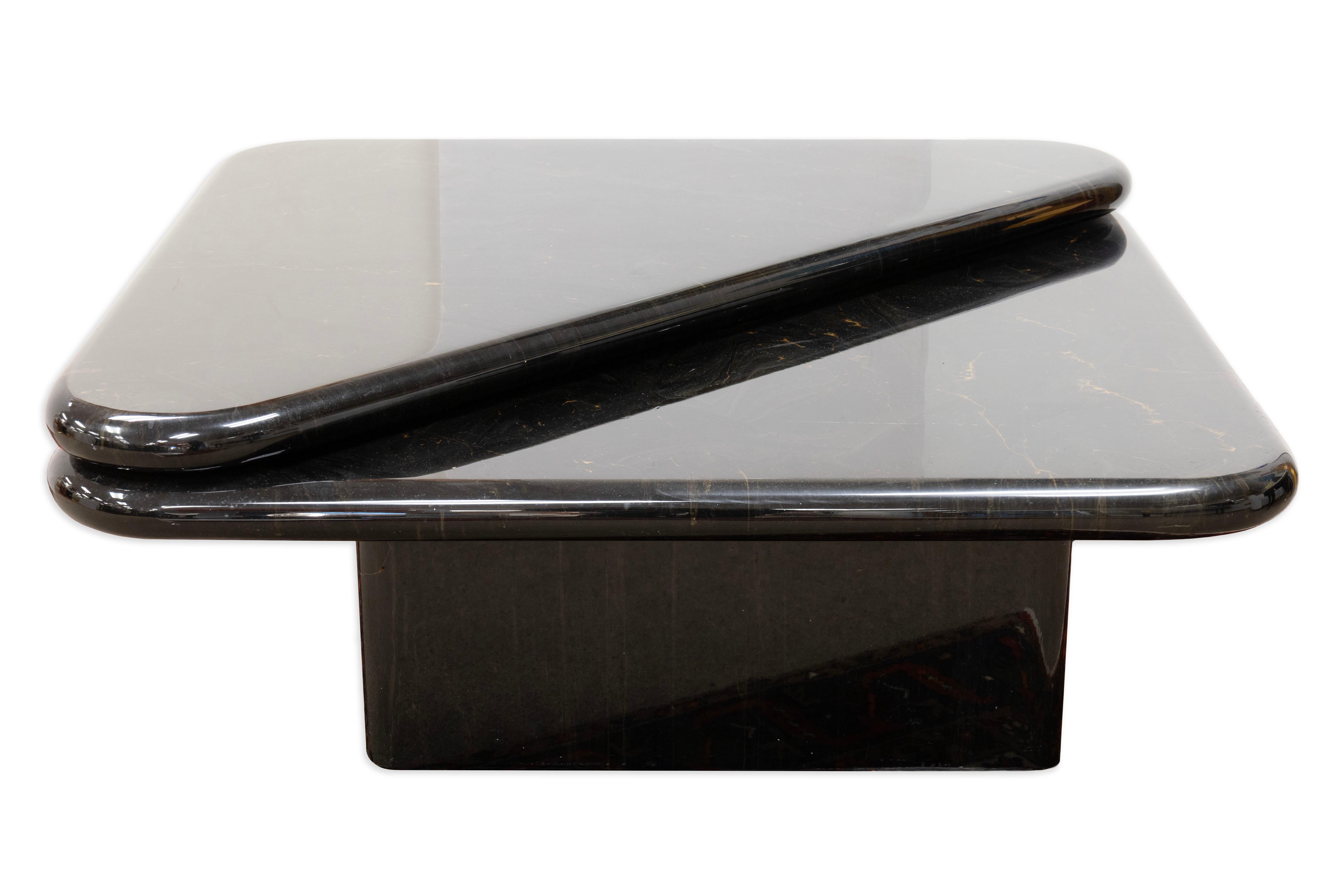 1980s Triangular Black Faux Marble Swivel Coffee Table In Good Condition For Sale In Keego Harbor, MI