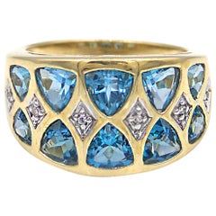Vintage 1980s Trilliant Cut Blue Topaz Diamond Ring