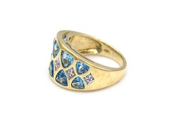 1980s Trilliant Cut Blue Topaz Diamond Ring