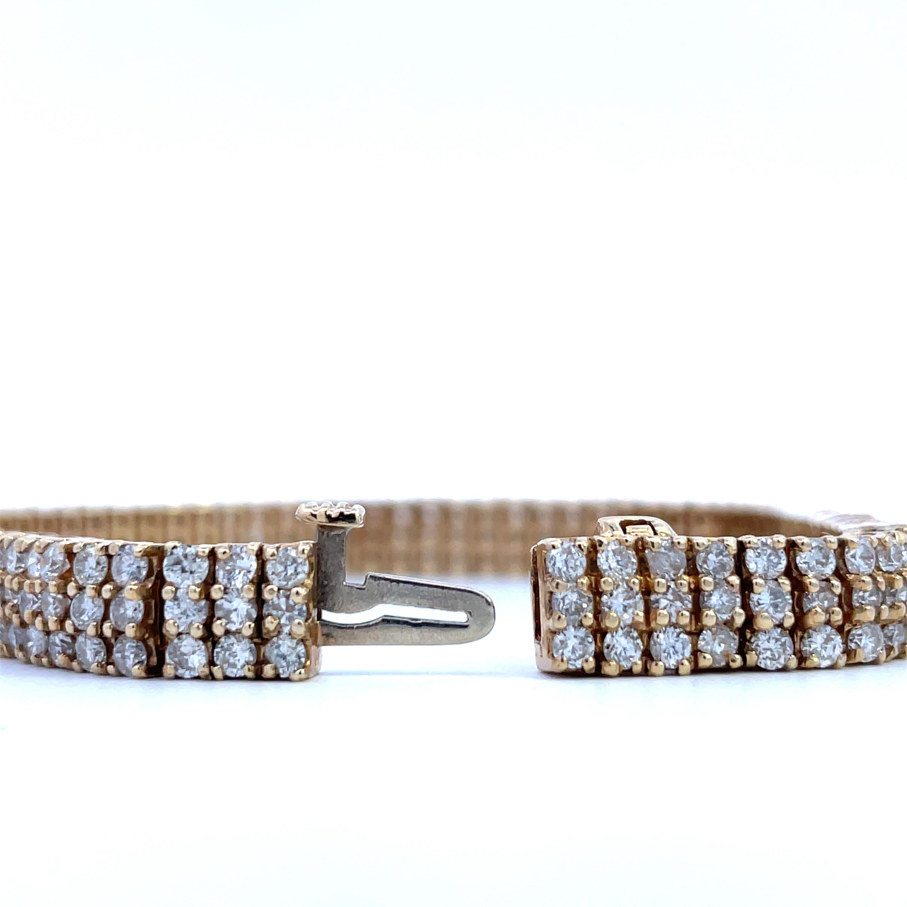 Contemporary 1980s Triple-Row Diamond Studded 14 Karat Yellow Gold Bracelet