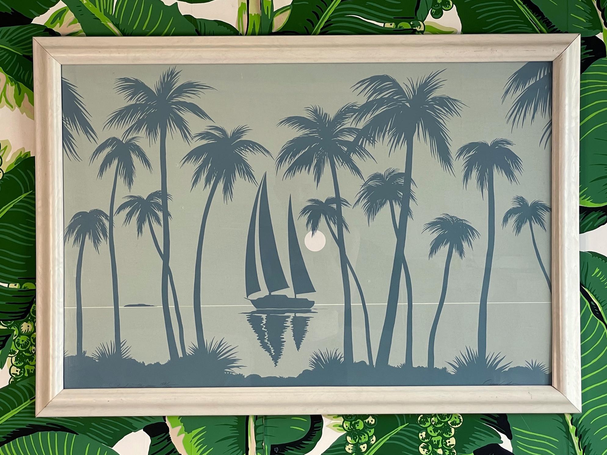 Cette impression encadrée des années 80 présente un voilier et des palmiers. Marqué 
