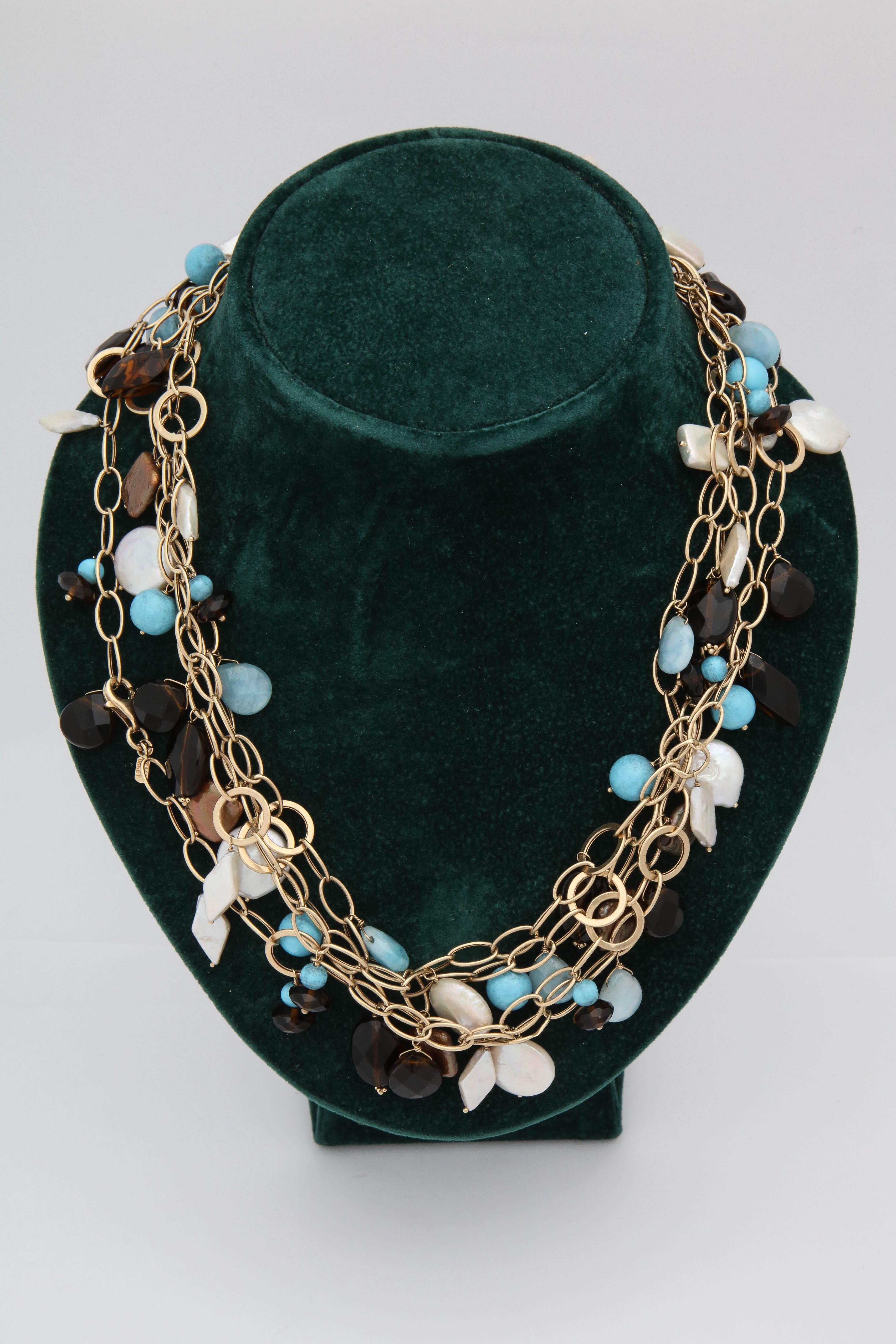 One Ladies 14kt Yellow Gold Extra Long Very Interesting Link Chain Necklace Designed With Numerous Turquoise Pieces And Also Designed With Tear Drop Shaped Raw Aquamarine Stones.Further Created With Numerous Faceted Different Shaped Citrine Stones
