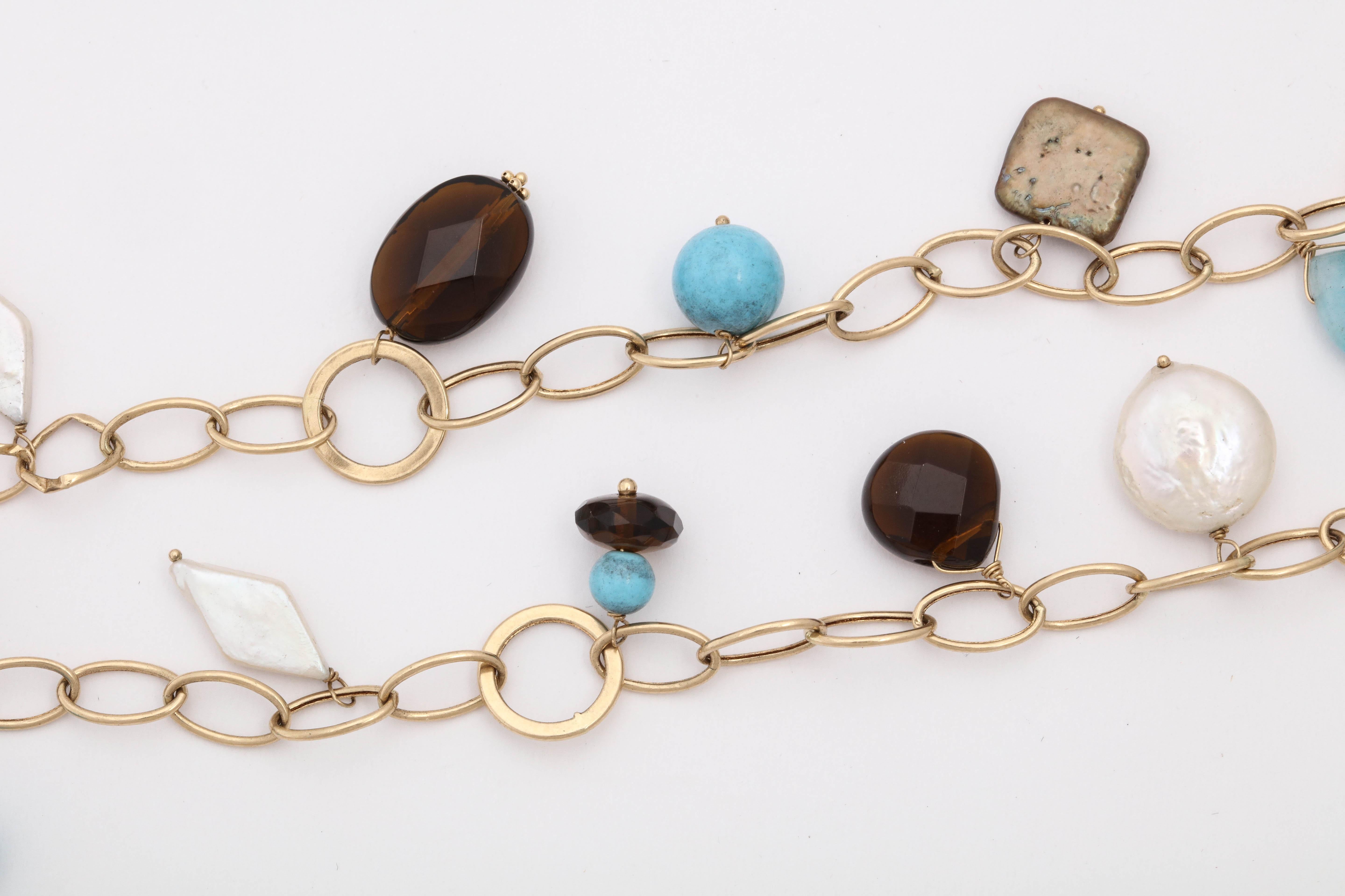1980s Turquoise with Citrines and Different Shaped Pearls Gold Long Link Chain In Good Condition For Sale In New York, NY