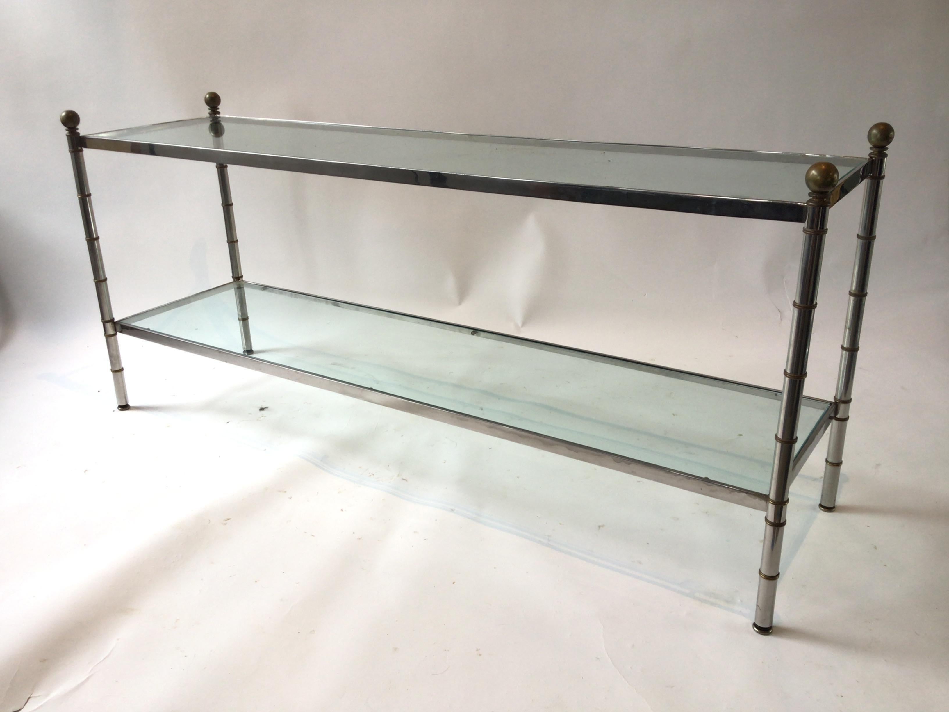 1980s Chrome and brass faux bamboo console with glass shelves.