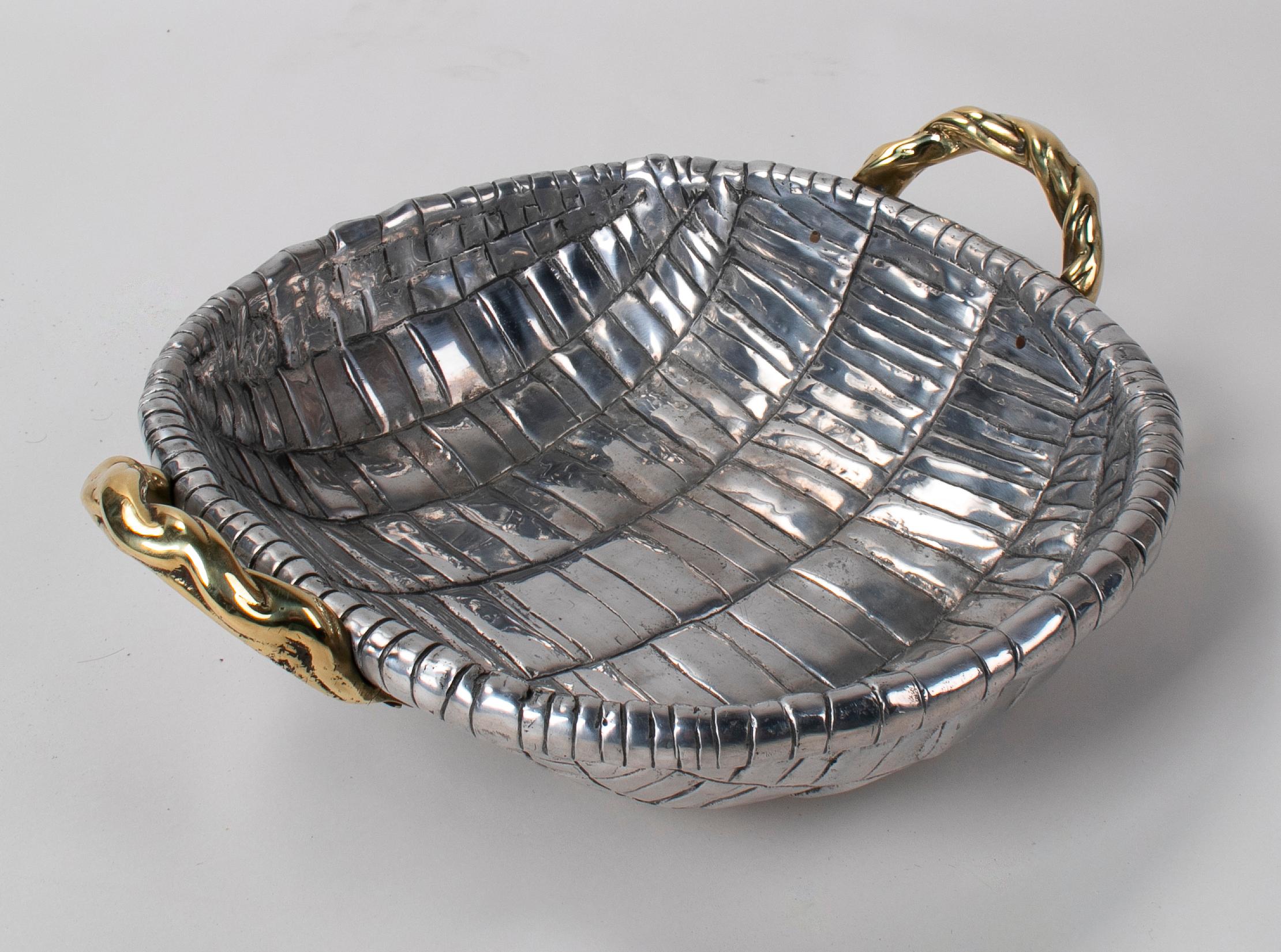 1980s two tone bronze fruit basket with stamped signature on the base.
 