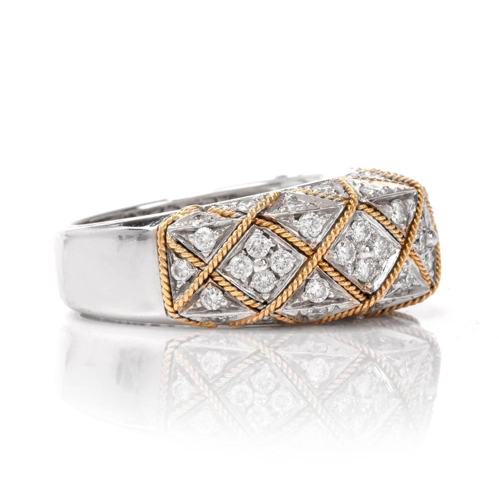 his estate band ring of notable feminine grace is crafted in a combination of 18 karat white and yellow gold. Designed as a subtly domed plaque measuring 9 mm wide and 7 mm high, this ring is adorned with 1. 55 carats of pave diamonds graded G-H