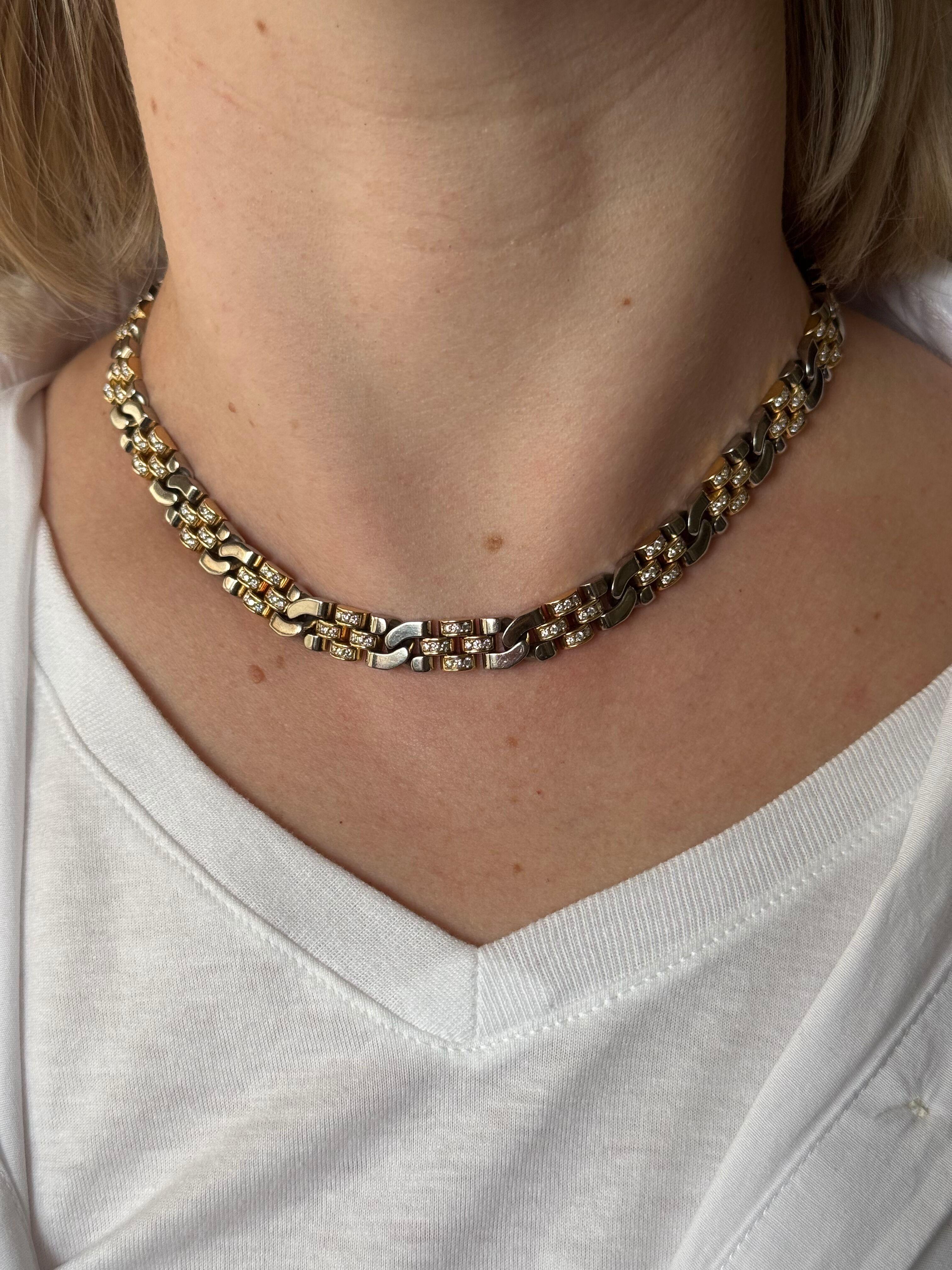 1980s vintage 18k white and yellow gold link necklace, adorned with approx. 2.40ctw H/SI1 diamonds. Necklace is 16.5