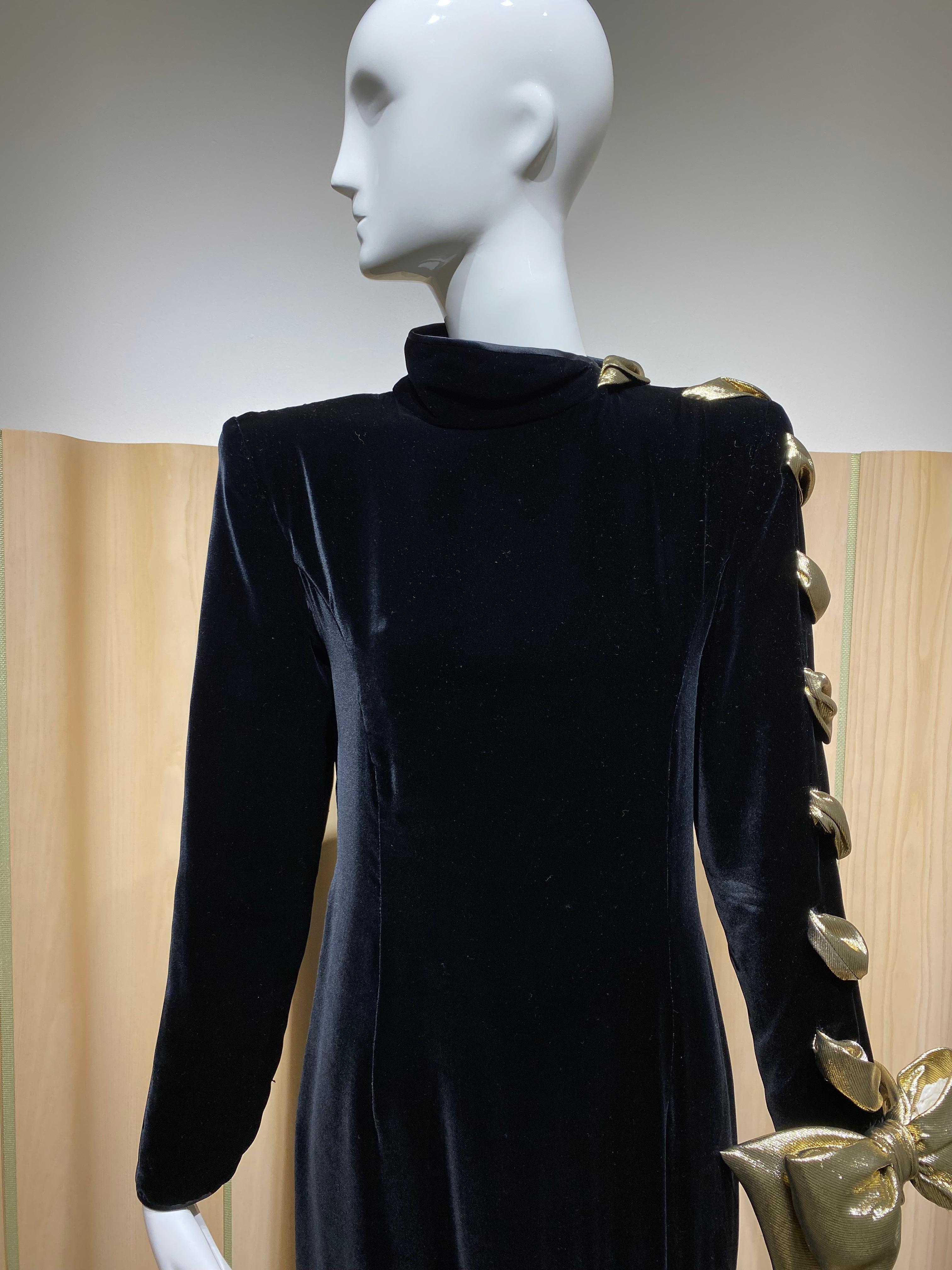 1987 Chic Valentino Black Velvet long sleeve gown with silk lame bow and exaggerated collar and shoulder pads. Perfect for evening gala or wedding.
Gown is lined in silk and its in excellent condition. 
Size: 4/6 
Measurement: B:34” / W:30” / Hip: