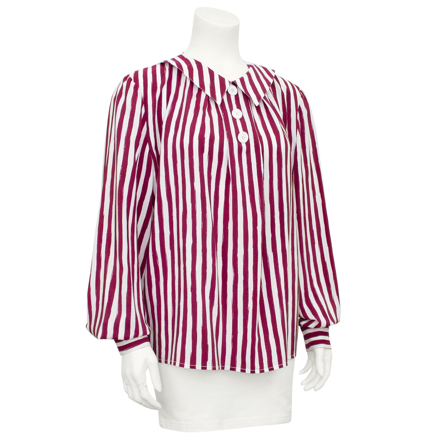 Very sweet 1980s Valentino blouse. Deep burgundy and white vertical stripes. Burgundy stripes look like paint strokes and are all slightly different. Demi Peter Pan collar with three large white plastic faux buttons and collar. Fits loose through