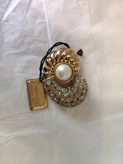 1980s Valentino Gold tone Swarovski Stones brooch