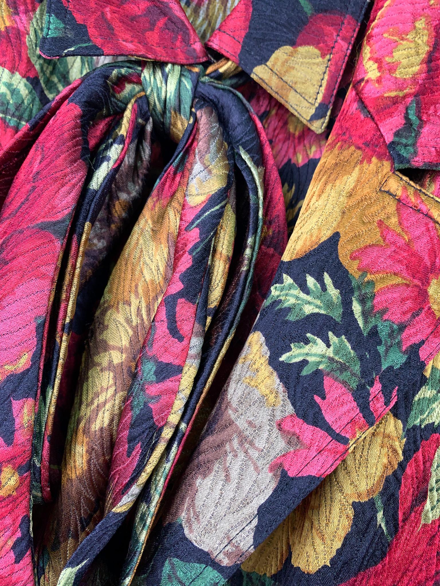 Vintage 80s Valentino Miss V multicolour floral silk two-piece ensemble of a single-breasted blazer and a blouse with bijou buttons and bow details.
Note the very dressy fabric - floral silk jacquard with fine embroidery that creates a subtle