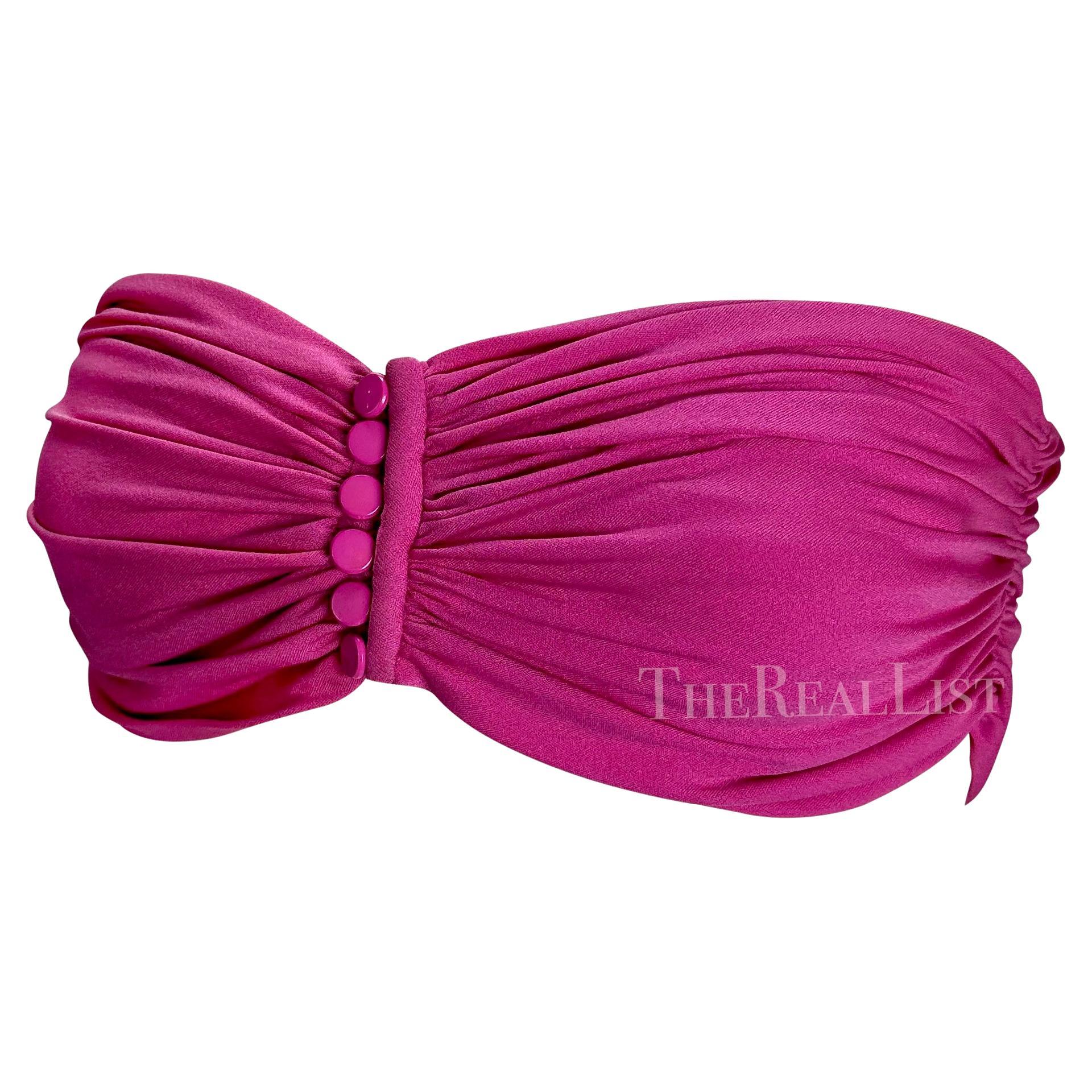 Presenting a fabulous hot pink Valentino Night bandeau top. From the 1980s, this beautiful ruched crop top features a button-down closure between the breasts. This ultra-sexy top is the perfect timeless vintage addition to any modern wardrobe!
