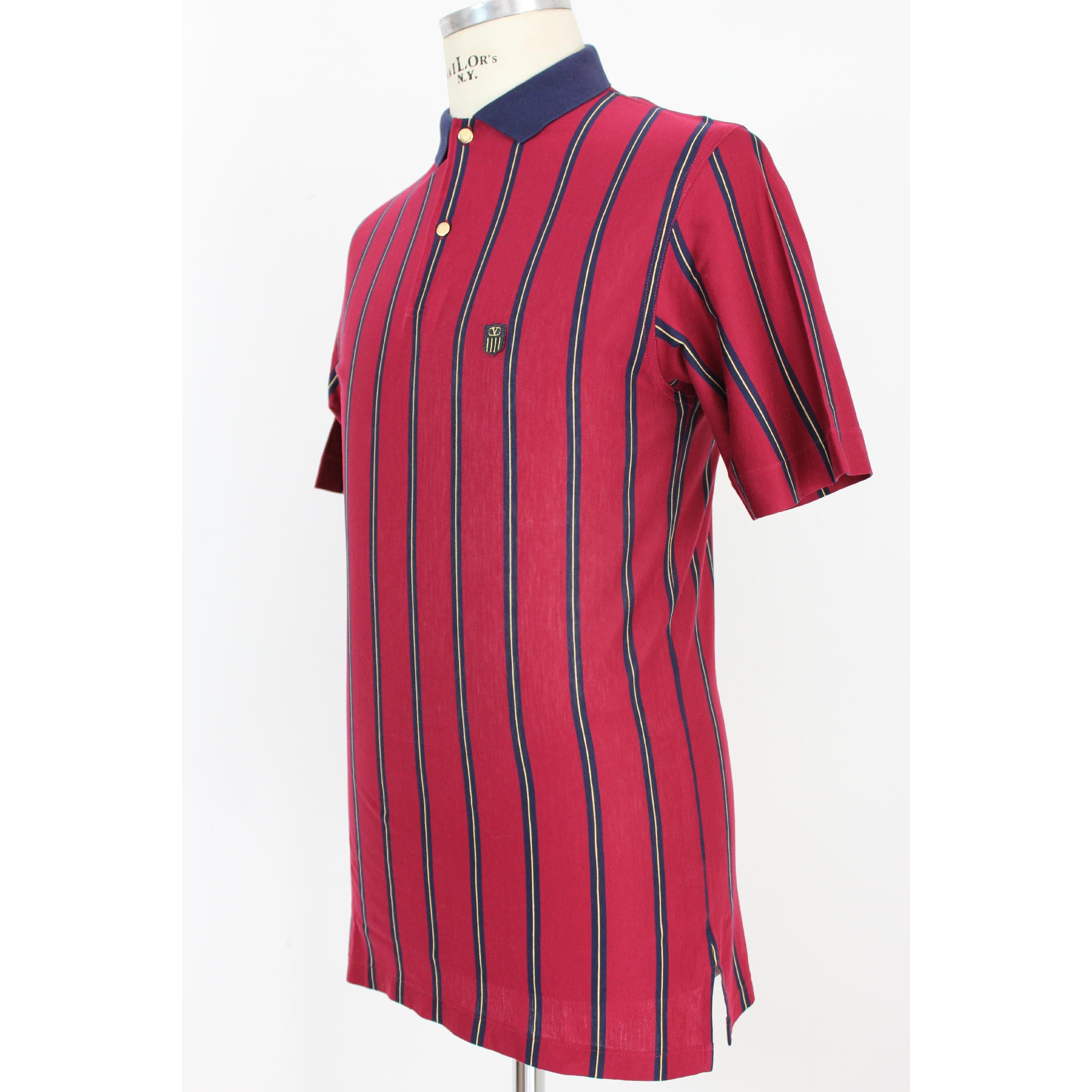 Valentino Sport men's vintage shirt. Polo model, red and blue striped, 100% cotton, short sleeve. 80s. Made in Italy. Excellent vintage condition. 

Size: 46 It 36 Us 36 Uk 

Shoulder: 46 cm
Bust/Chest: 48 cm 
Sleeve: 25 cm 
Length: 78 cm